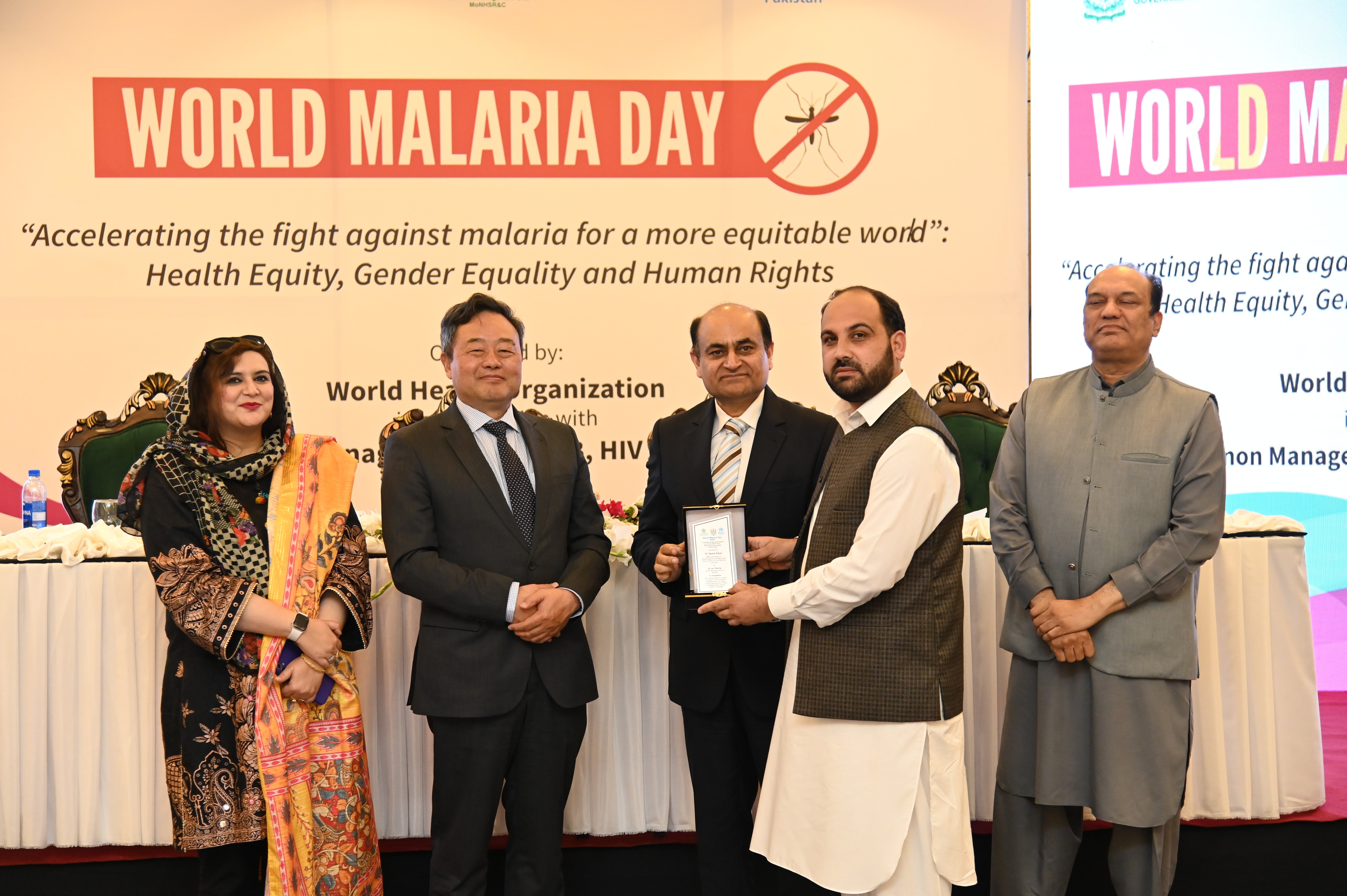 The shield distribution at the event of World Malaria Day 2032