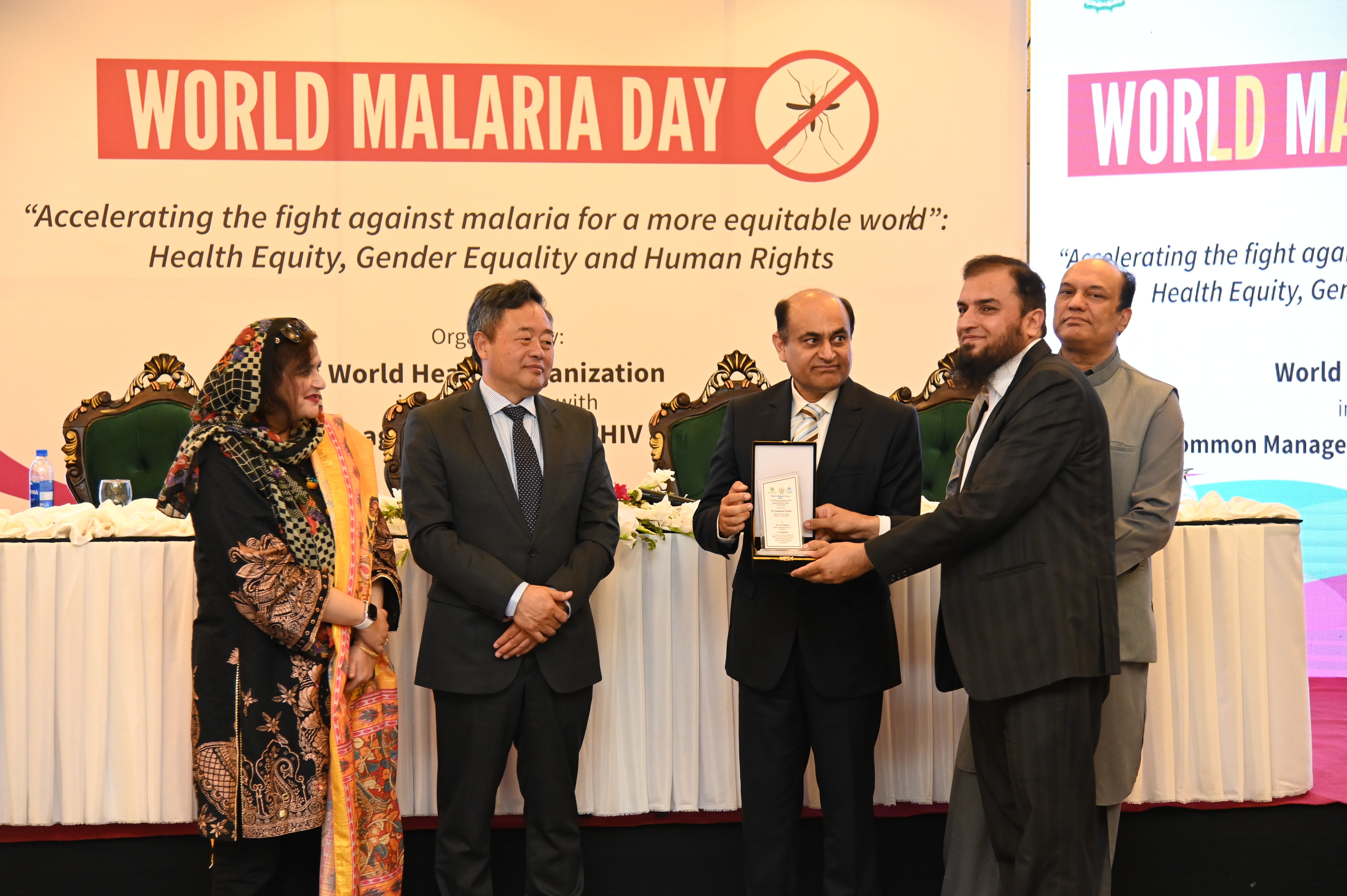 The shield distribution at the event of World Malaria Day 2033