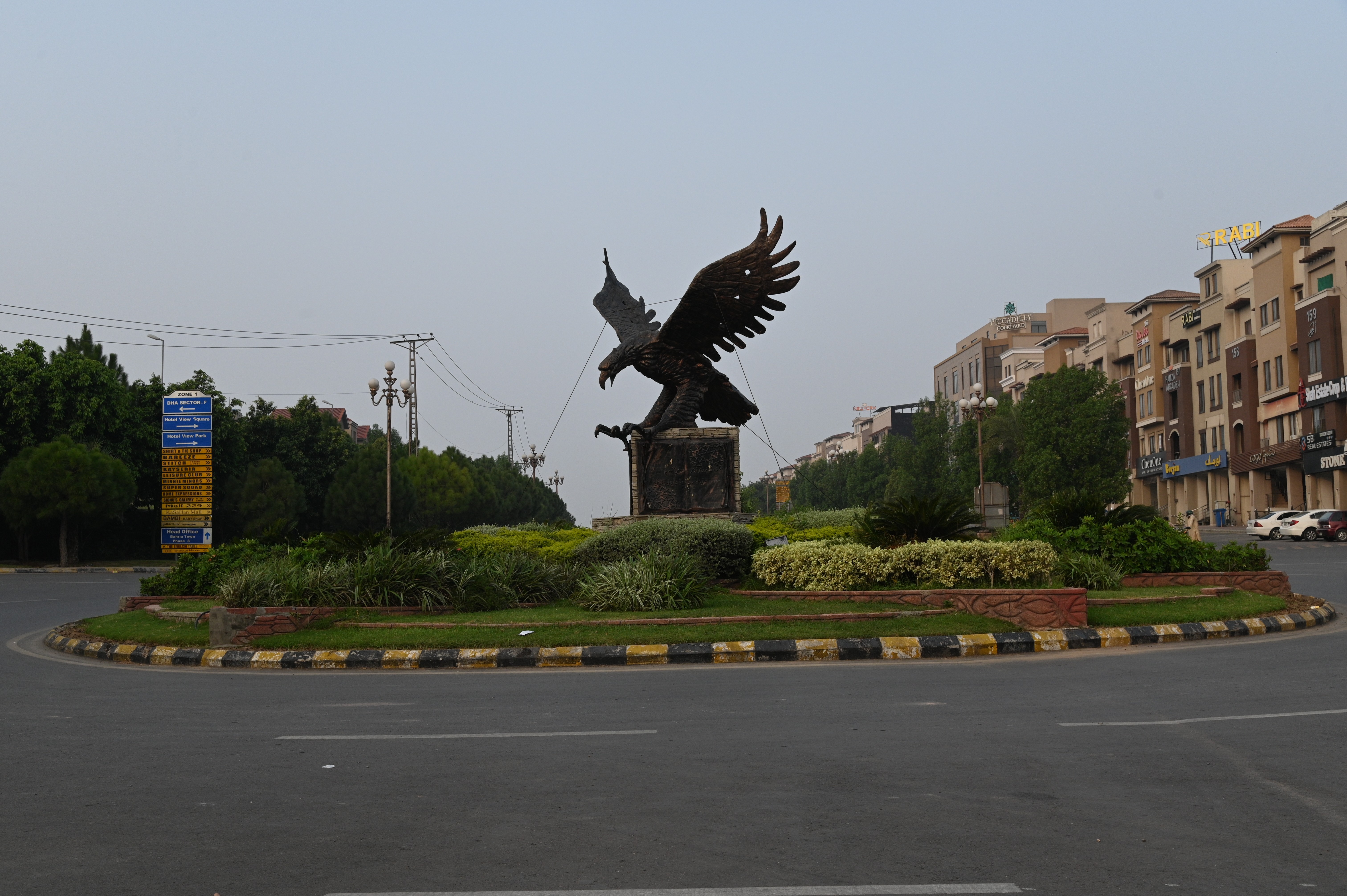 The sclupture of an eagle at the roundabout in DHA