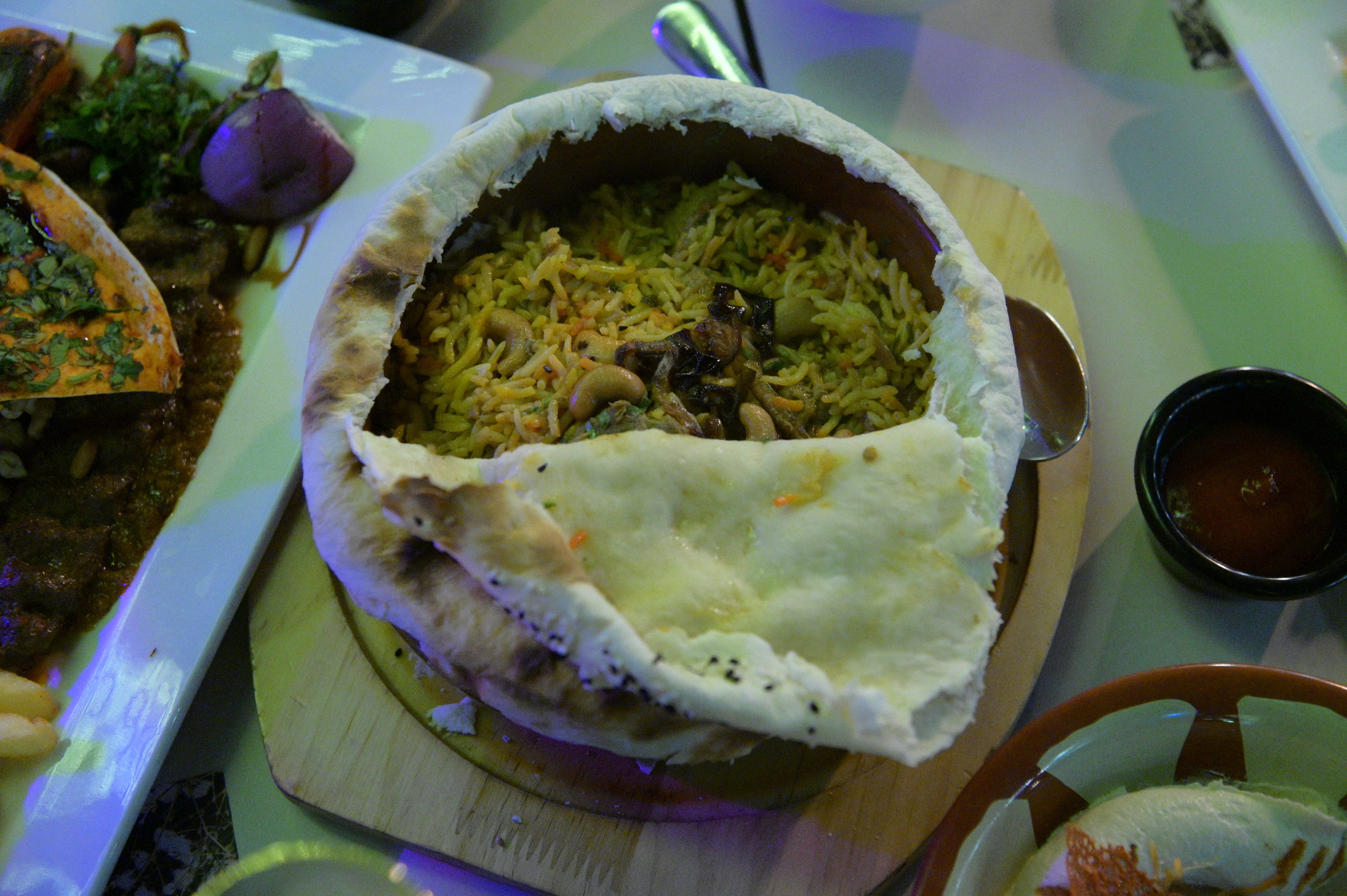 Parda Biryani : a delicious Biryani where par cooked rice is layered with cooked meat and steamed covered in a sheet of dough.