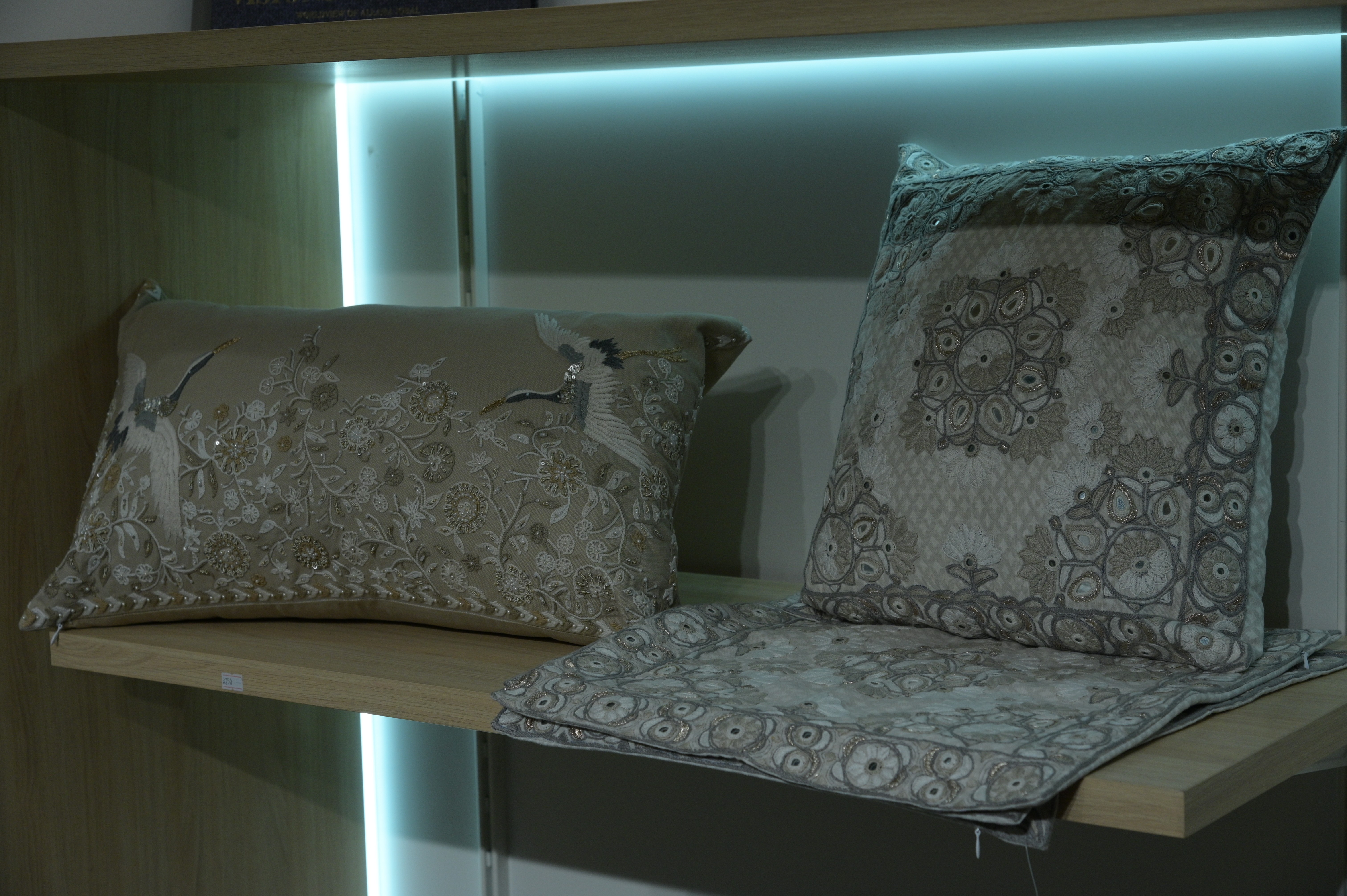 An embroided cushions and pillow case