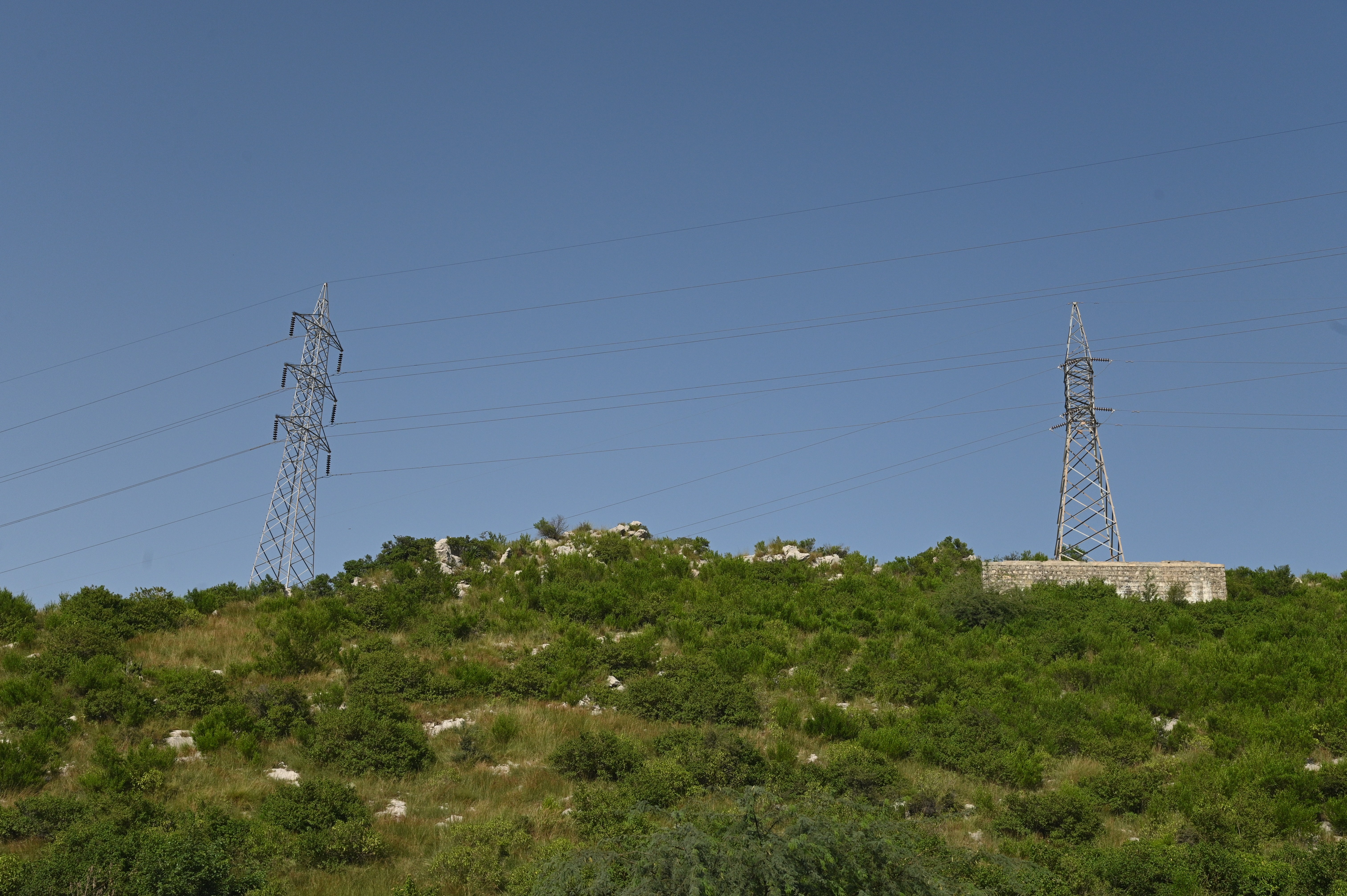 An overhead power line (a structure used in electric power transmission and distribution to transmit electrical energy along large distances)