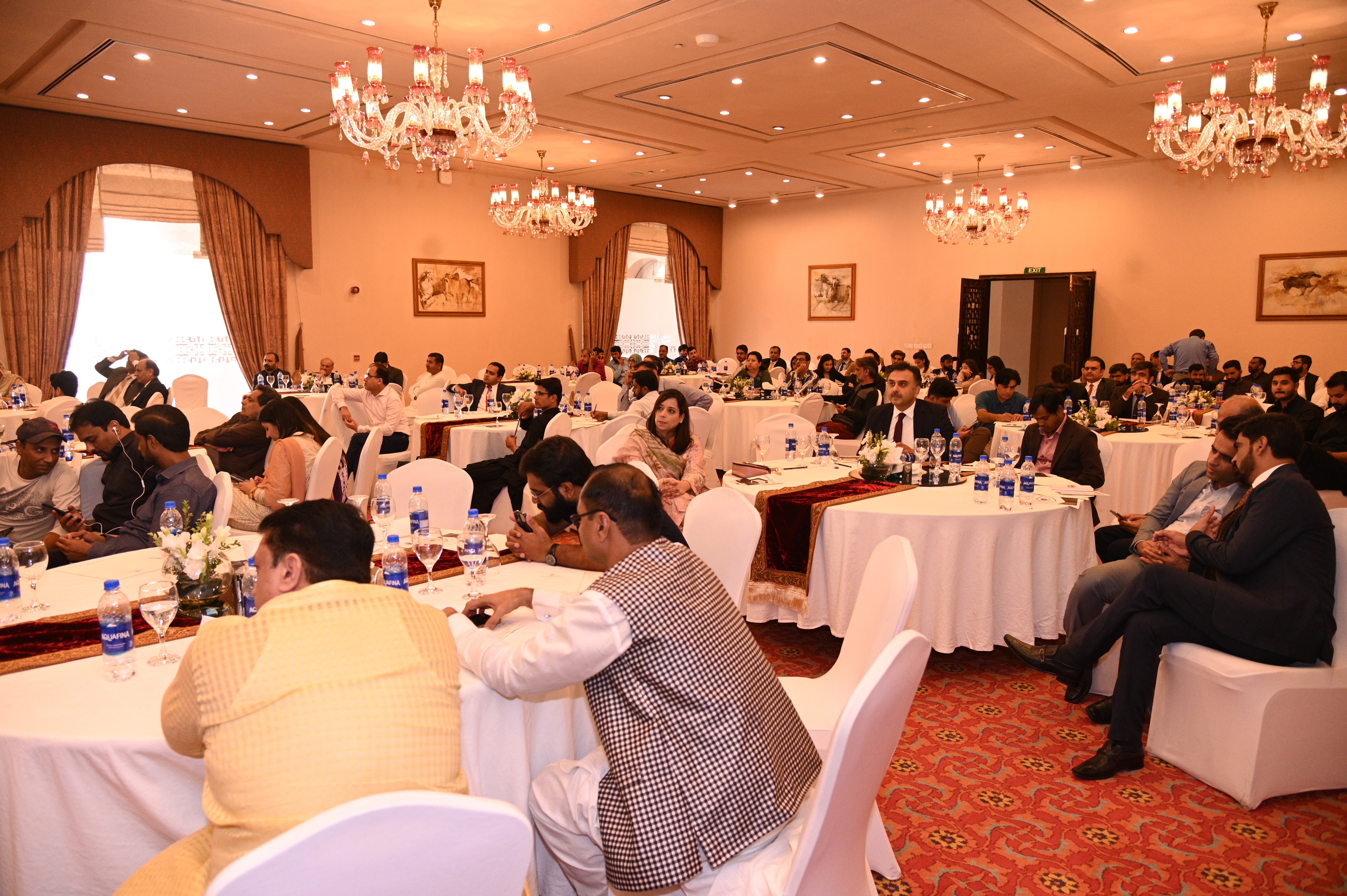 The participants in a conference on BRI organized by ministry of planning, development and special initiatives
