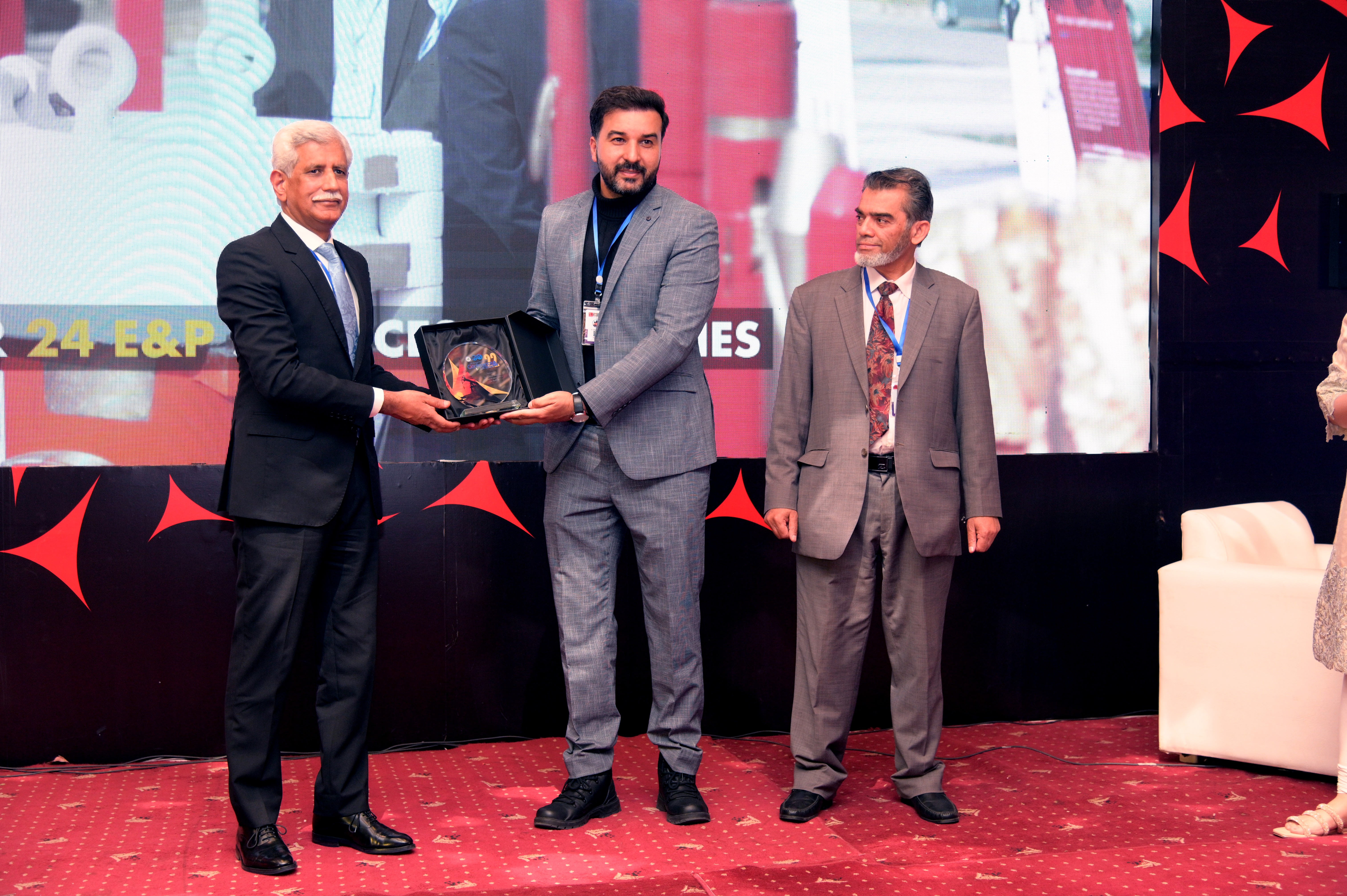 shields distribution ceremony to the participants at the event of conference and oil show