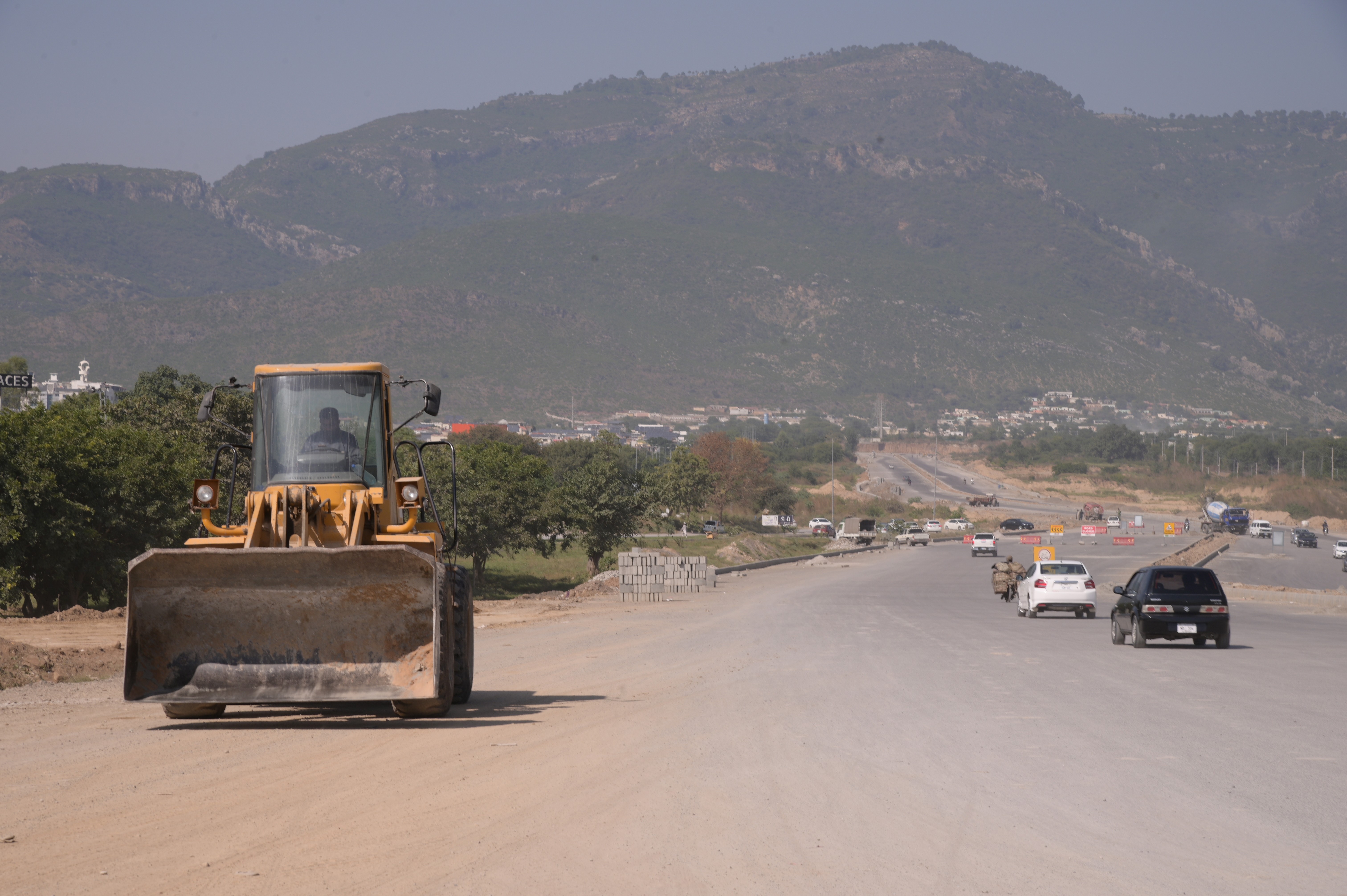 Traffic moving through a road under construction