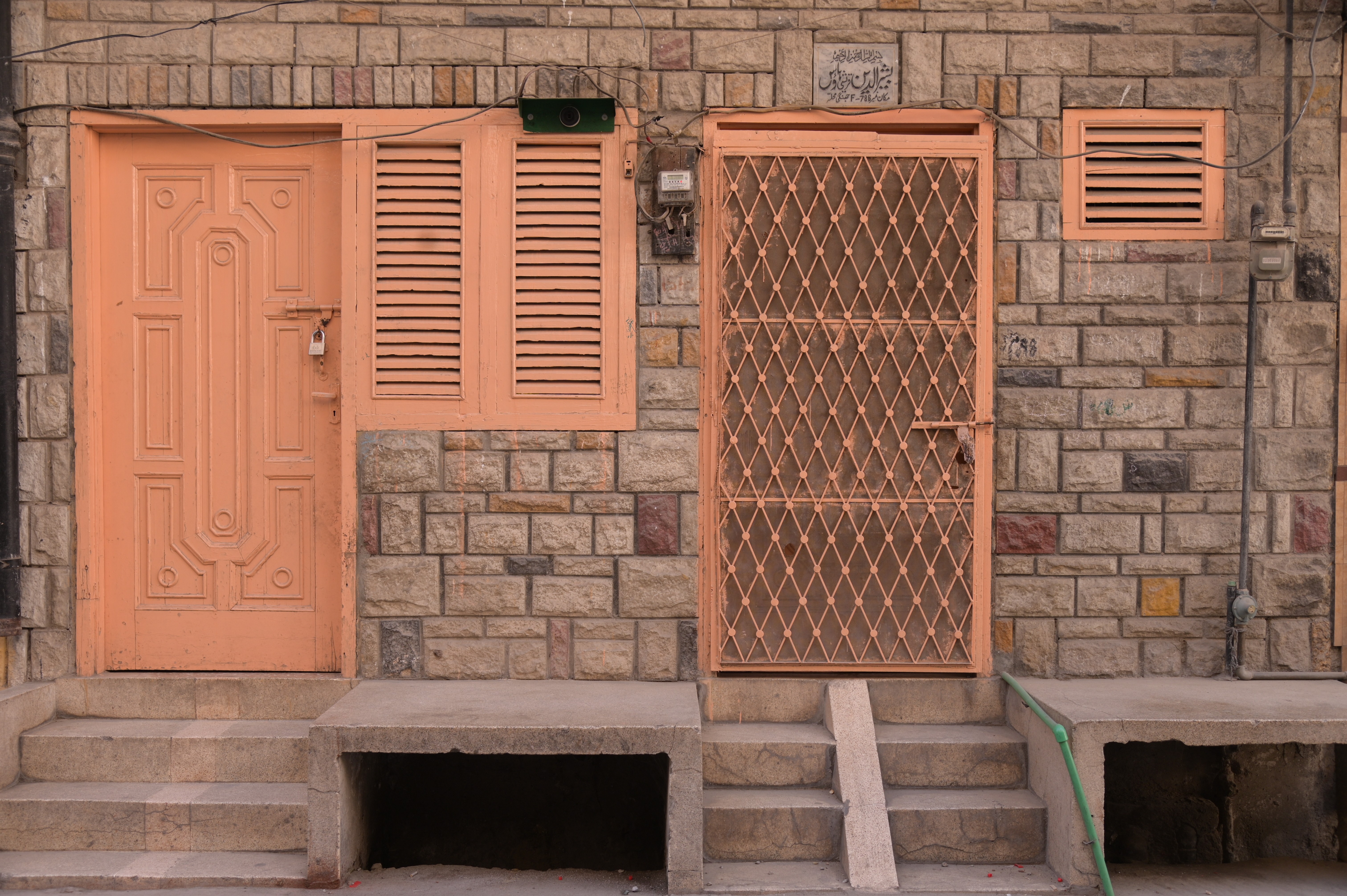 An old-fashioned house with wooden doors showing the ancient culture of Rawalpindi