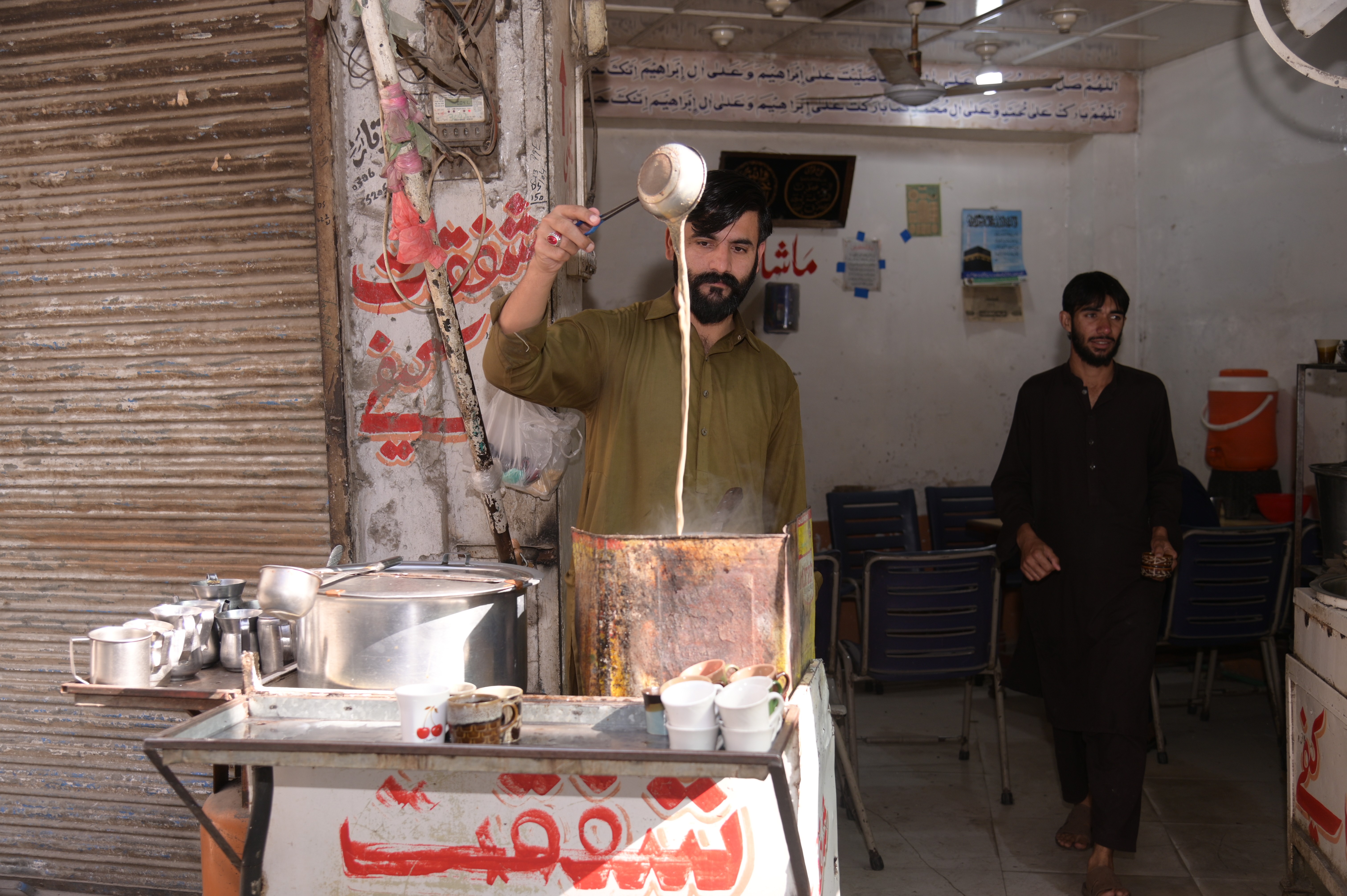 A man selling tea