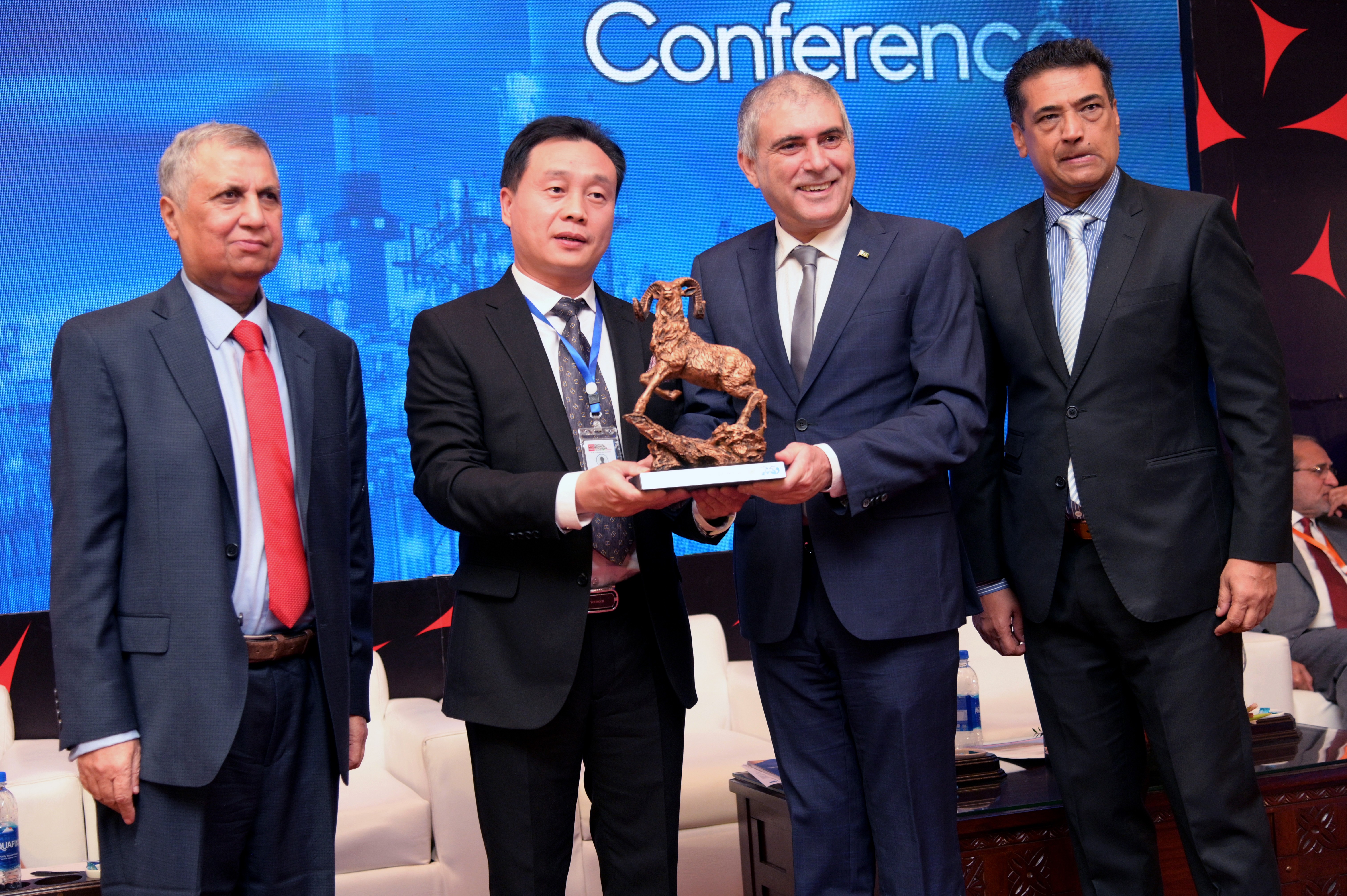 Shields distribution ceremony to the cooperate members at the event of conference and oil show