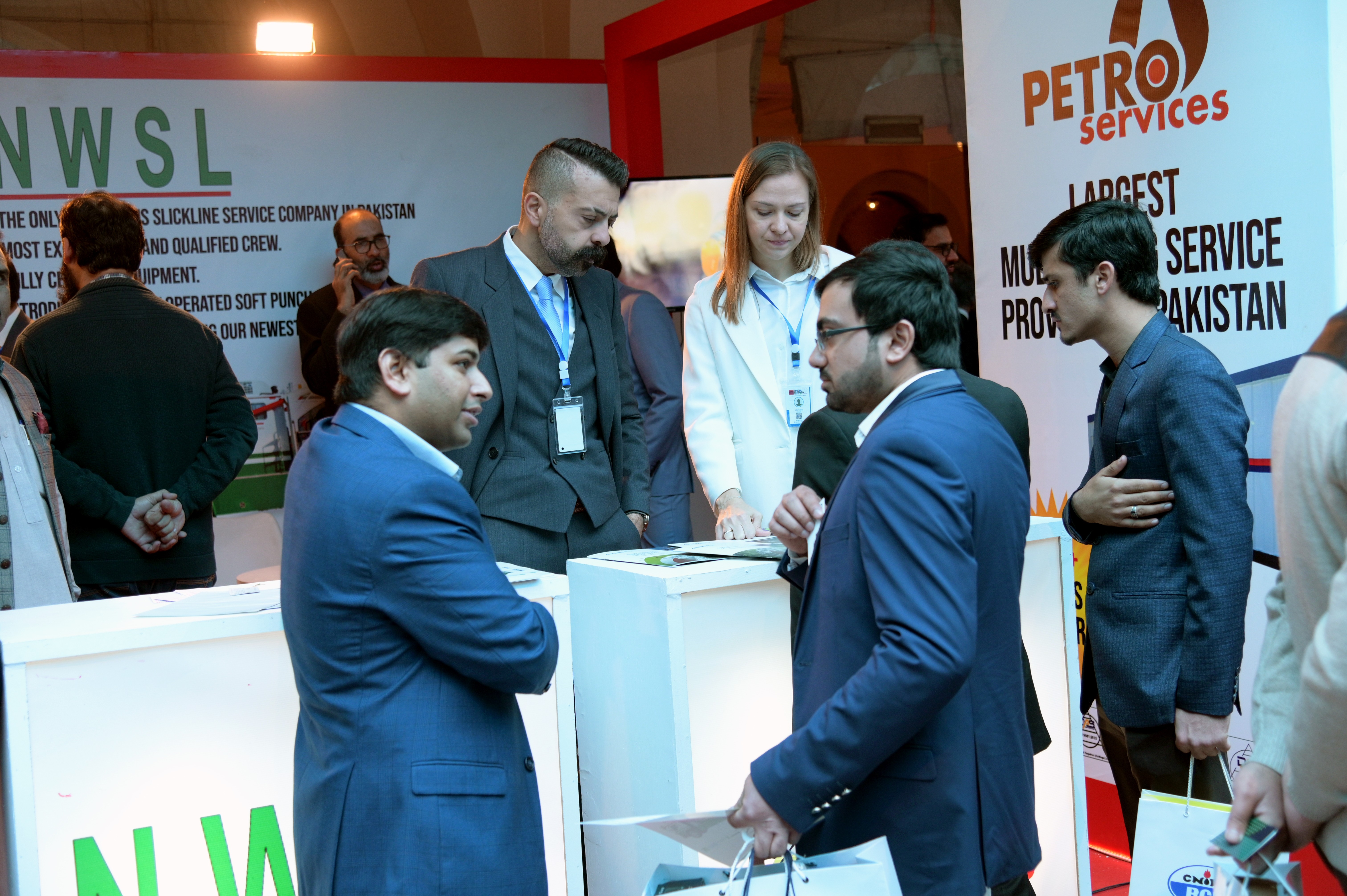 People discussing about the firm in the block of petro service