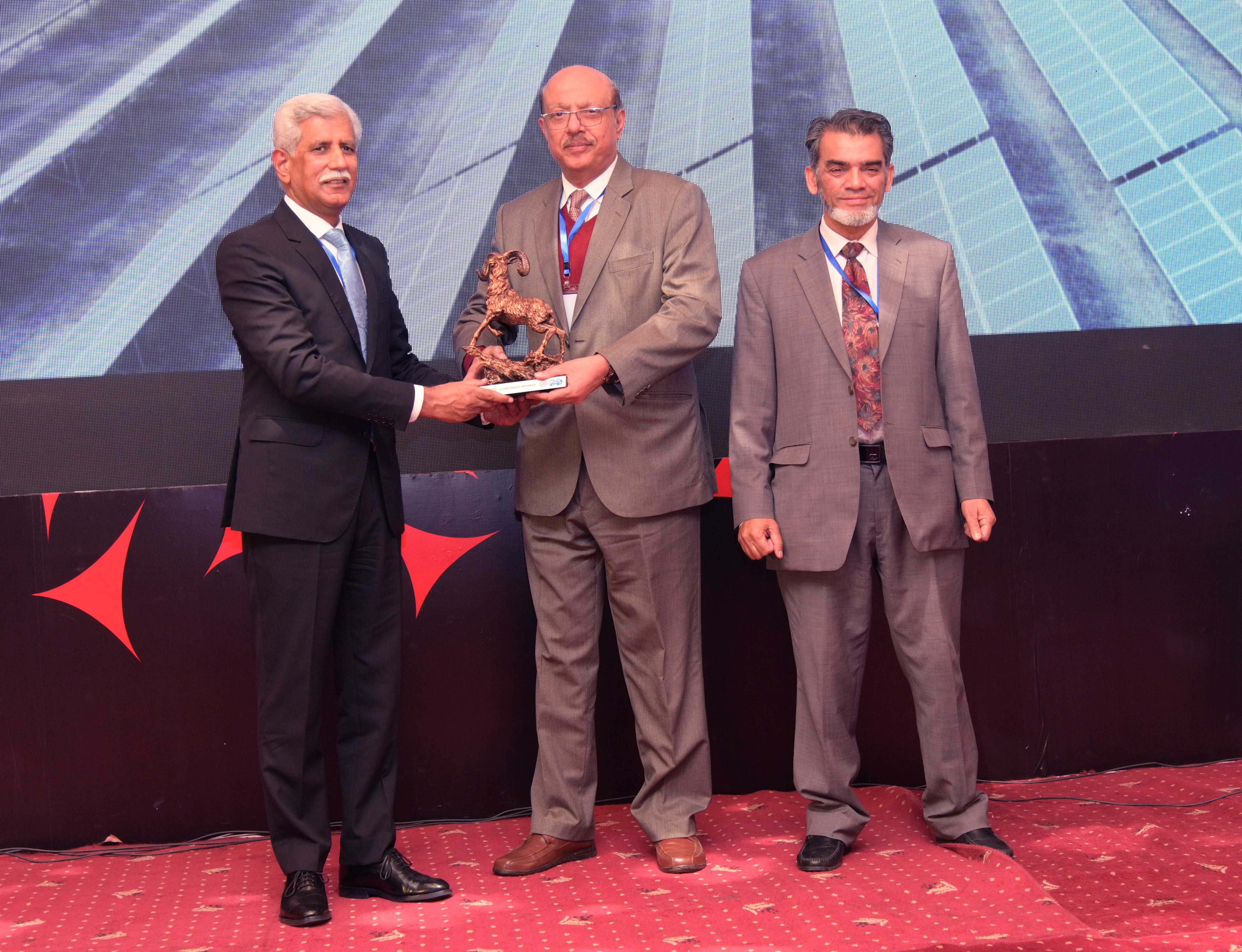 Shields distribution ceremony to the cooperate members at the event of conference and oil show
