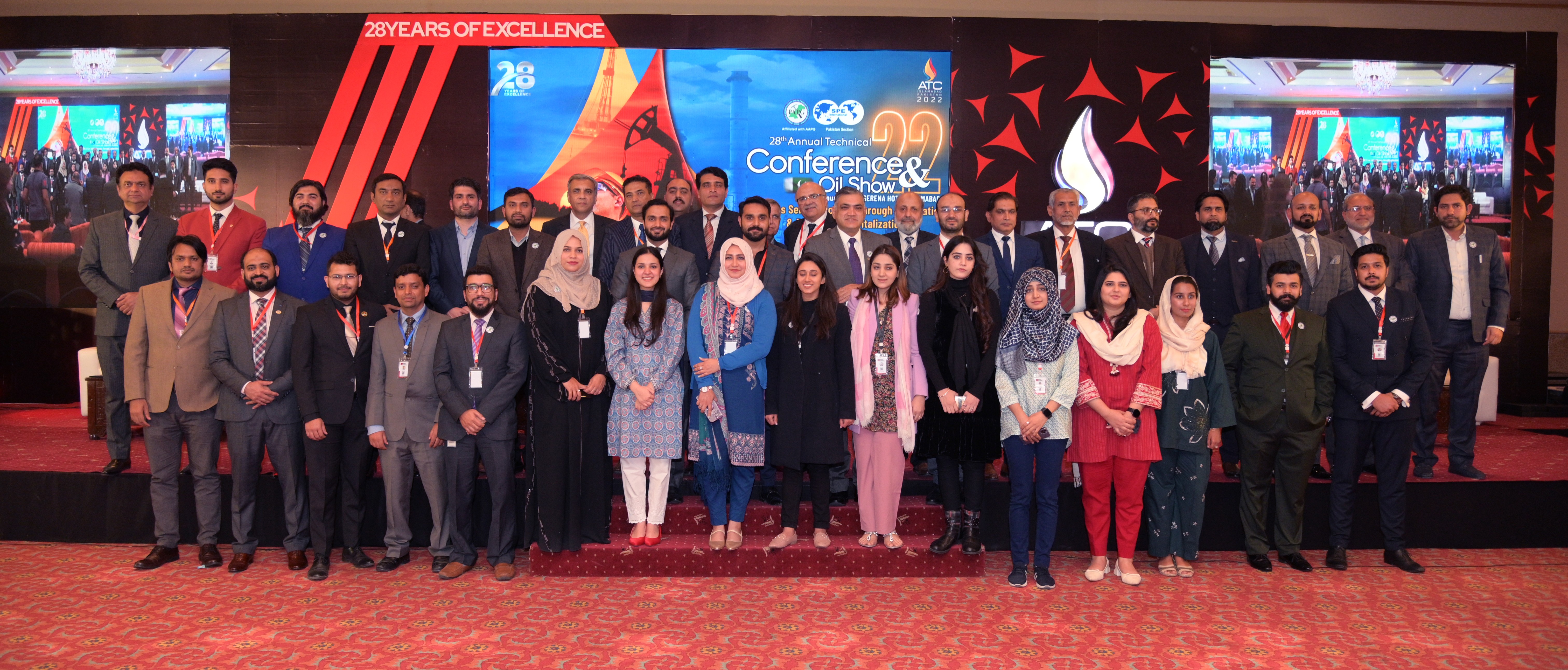 The group photo of all the members and participants of oil show conference with the chief guests