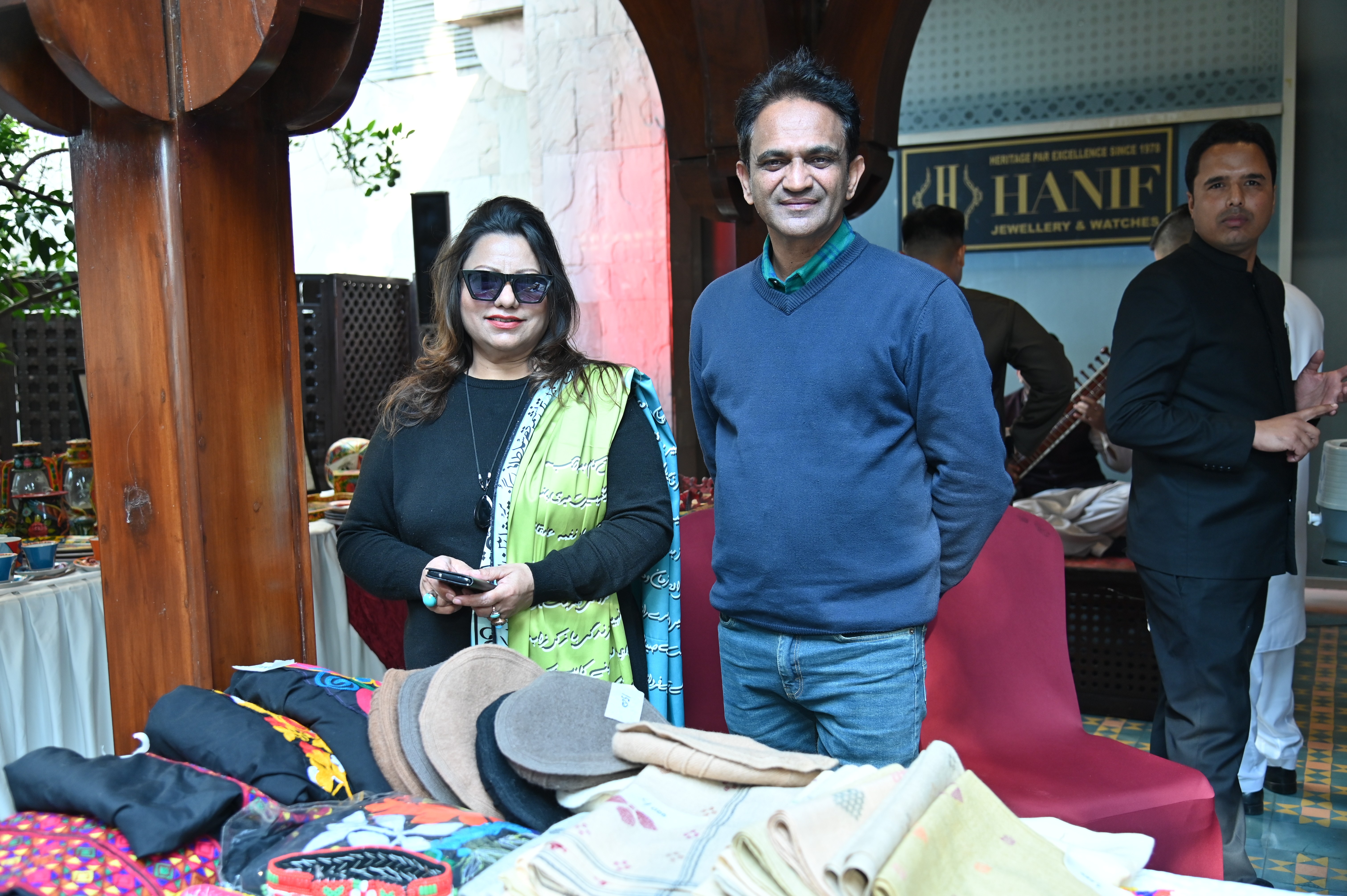 The visitors at the stall of traditional shawls and caps of Hunza at an event of Crafts festivals at Sarena Hotel