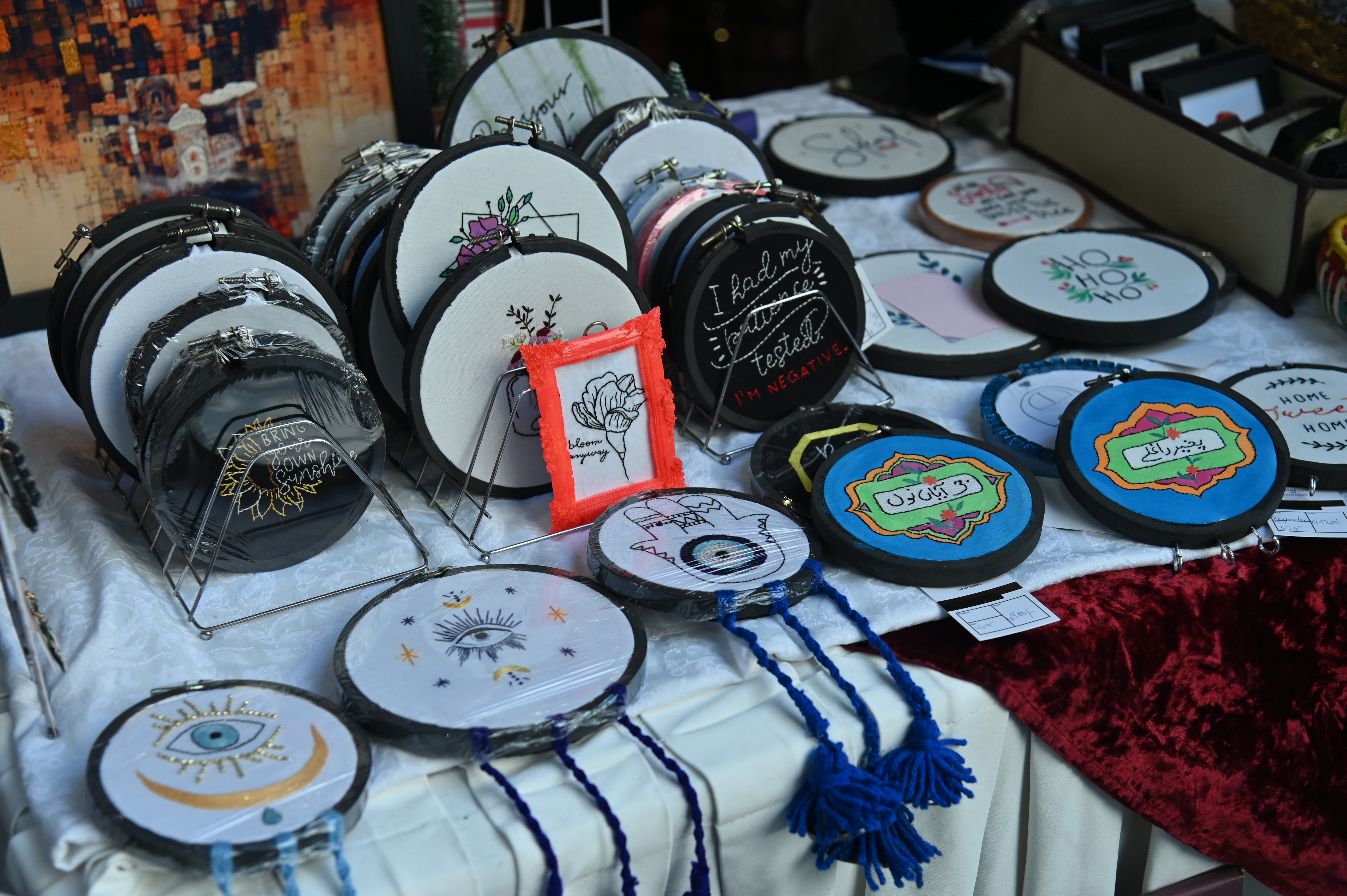 Small embroidered frames for sale at the Crafts Festival 2023