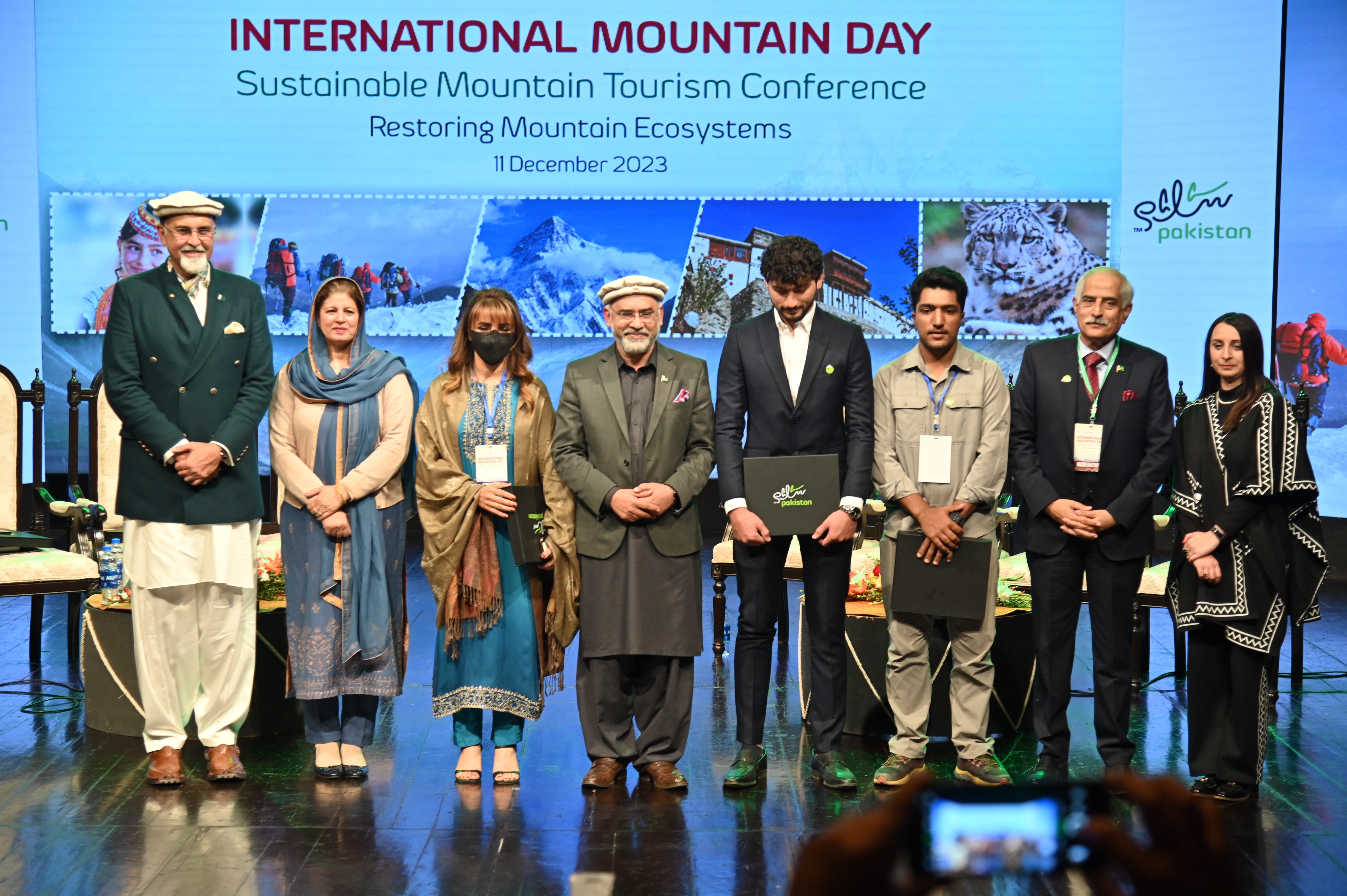 The group photo of the speakers and the participants at the award distribution ceremony on  International Mountain Day at PNCA