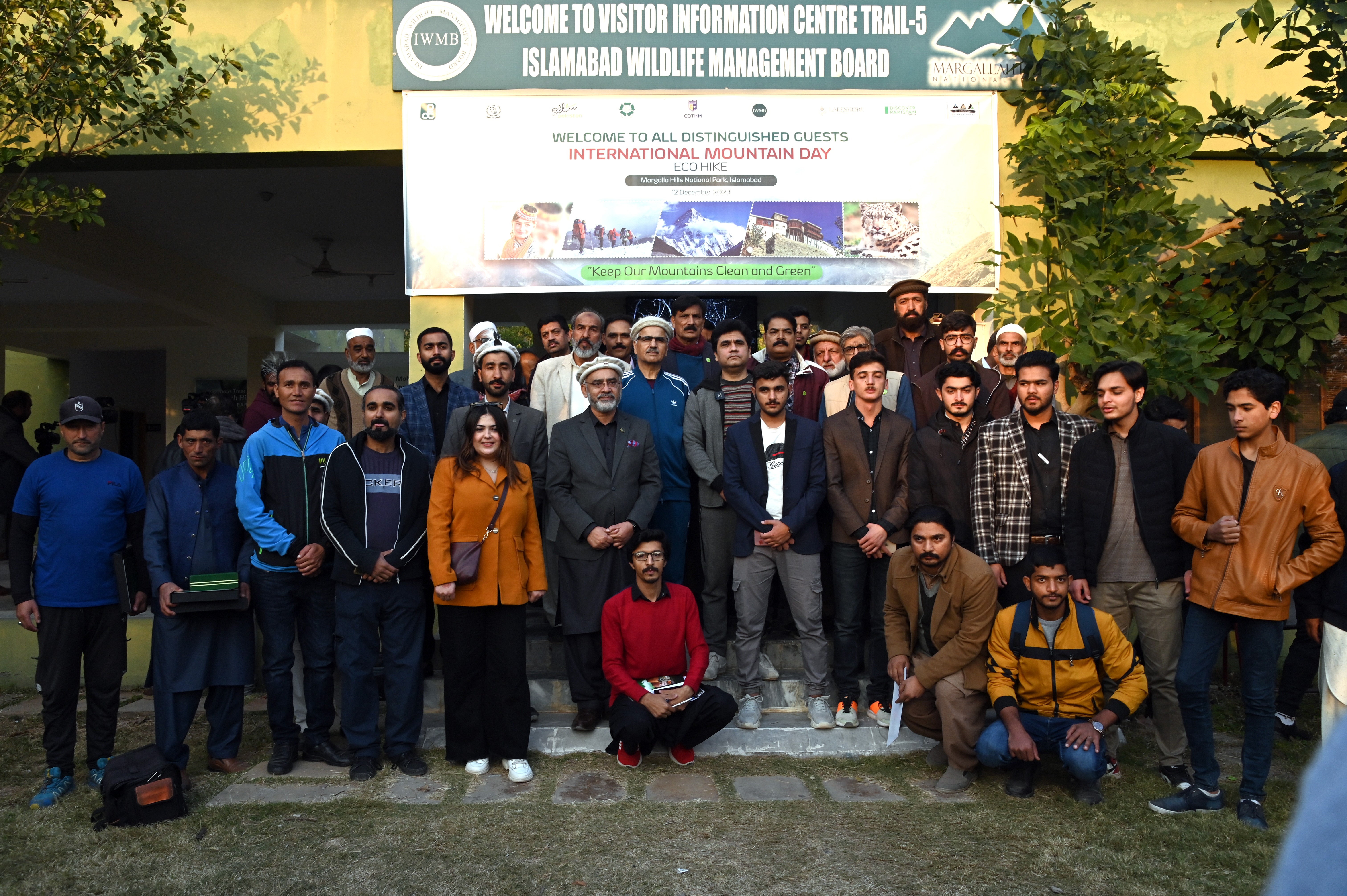 The group photo of the speakers and the participants at the award distribution ceremony on  International Mountain Day at Trail-5