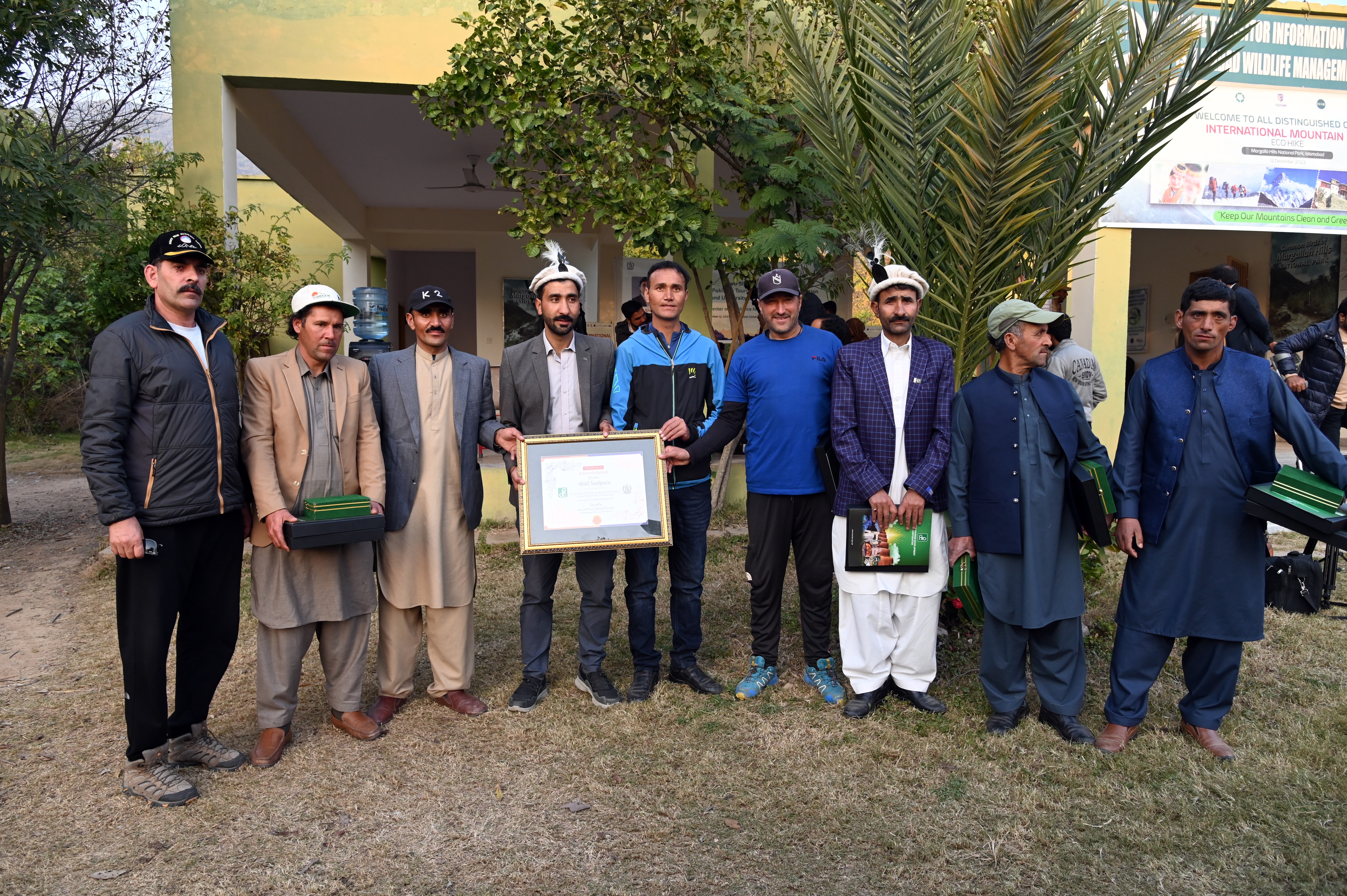 The group photo of the speakers and the participants at the award distribution ceremony on  International Mountain Day at Trail-6