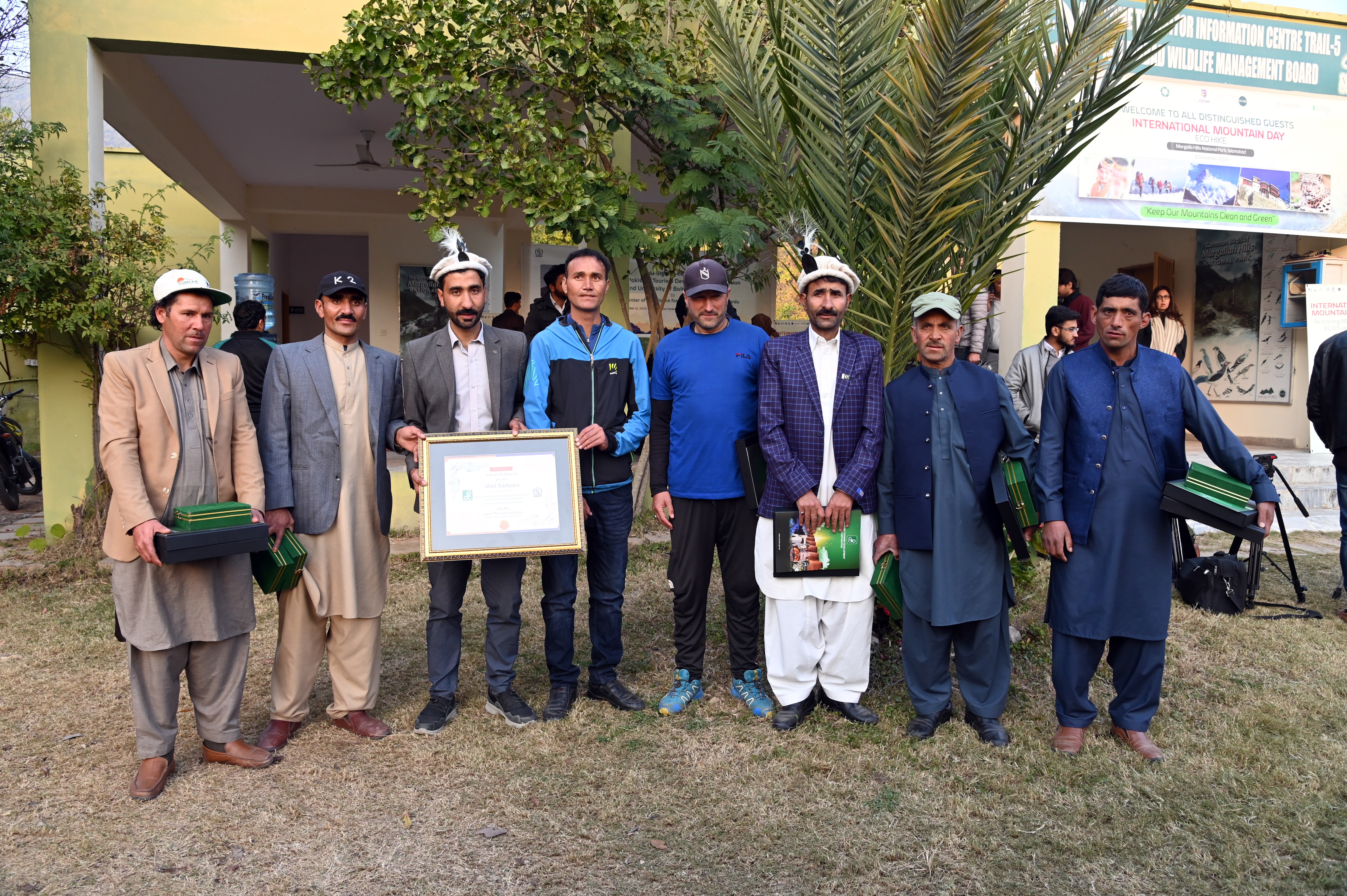 The group photo of the speakers and the participants at the award distribution ceremony on  International Mountain Day at Trail-7