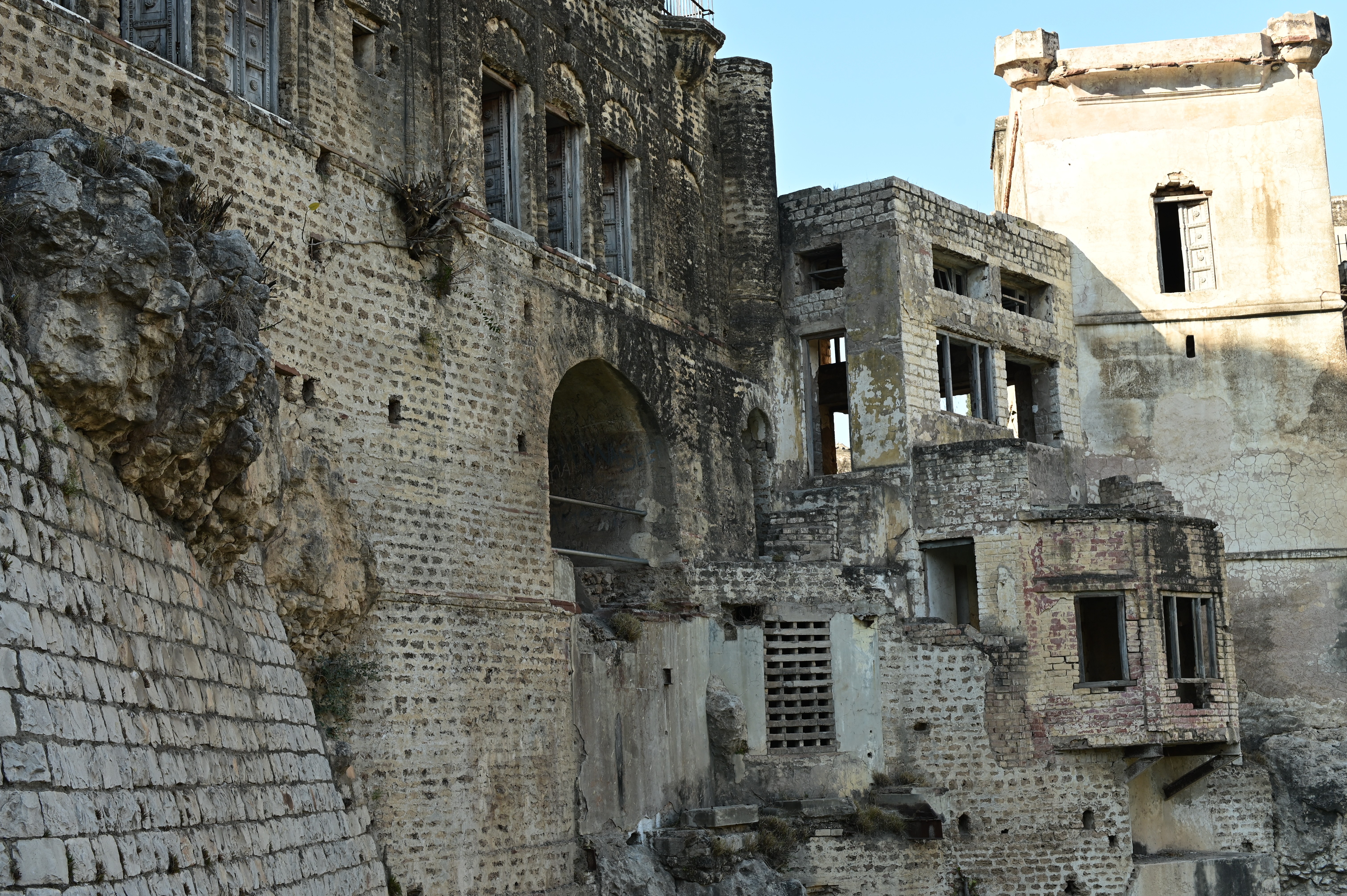 The exterior view of crumbling beauty and fading colors of Katas Raj Temples symbolizing the ancient Hindu Culture