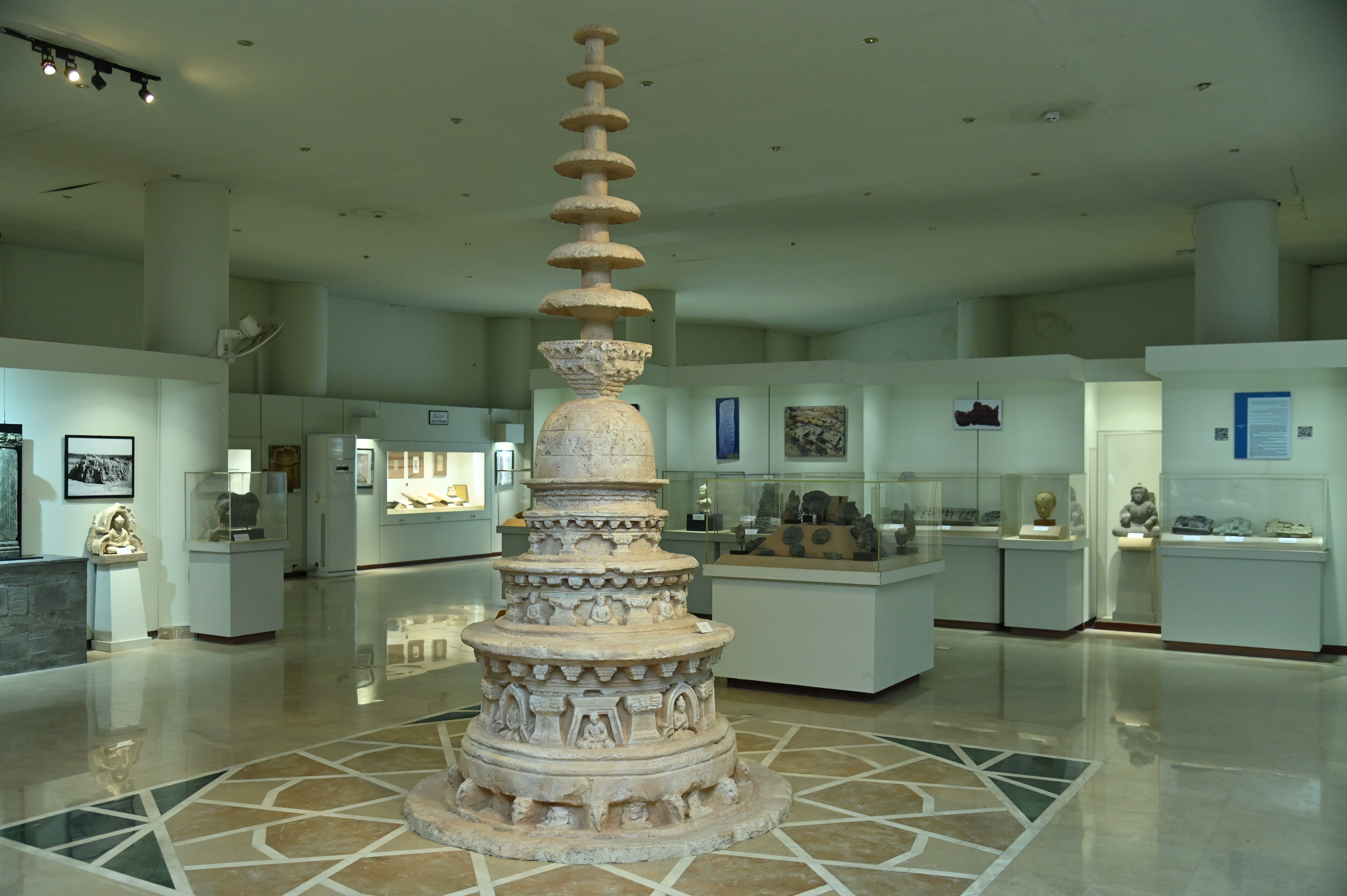 The Replica of Mohra Moradu Votive Stupa in Sir Syed Memorial Museum which is originally 4m (13 ft) tall