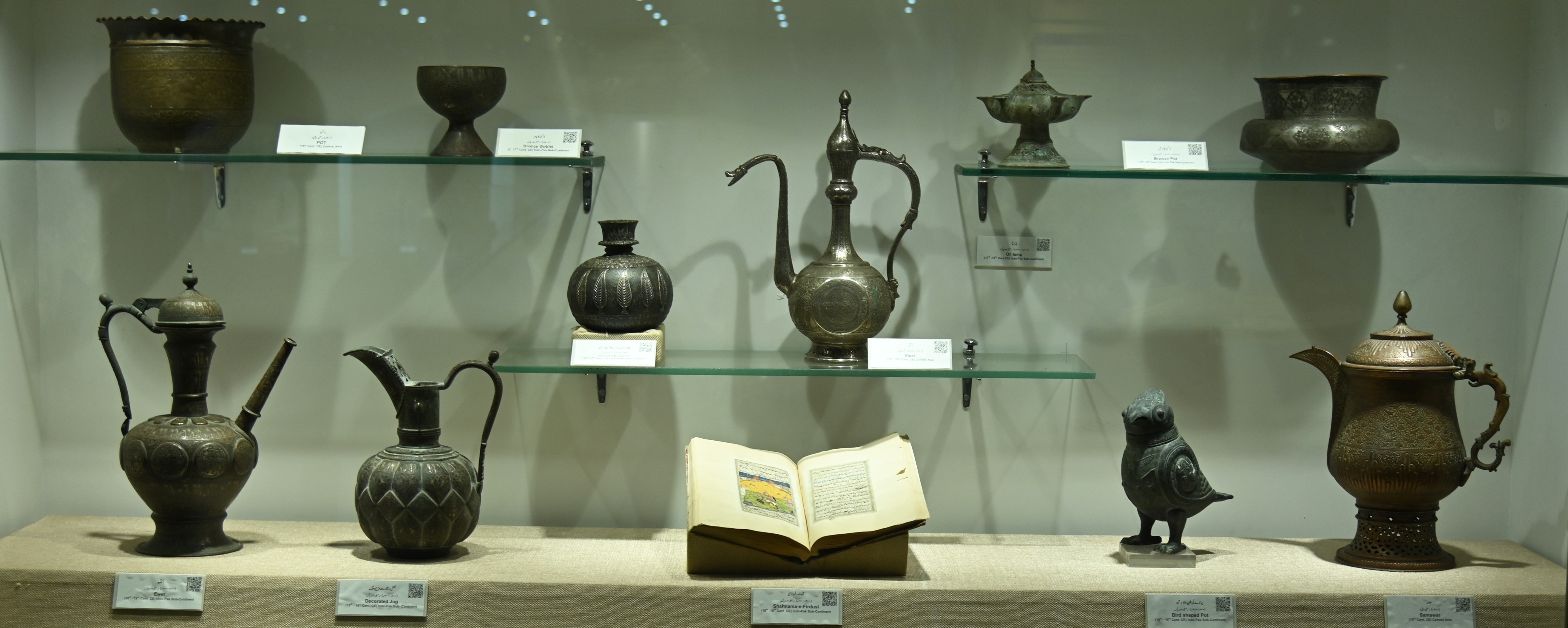 The Ancient Pottery comprising of Jar, Ewer and Bronze Goblet