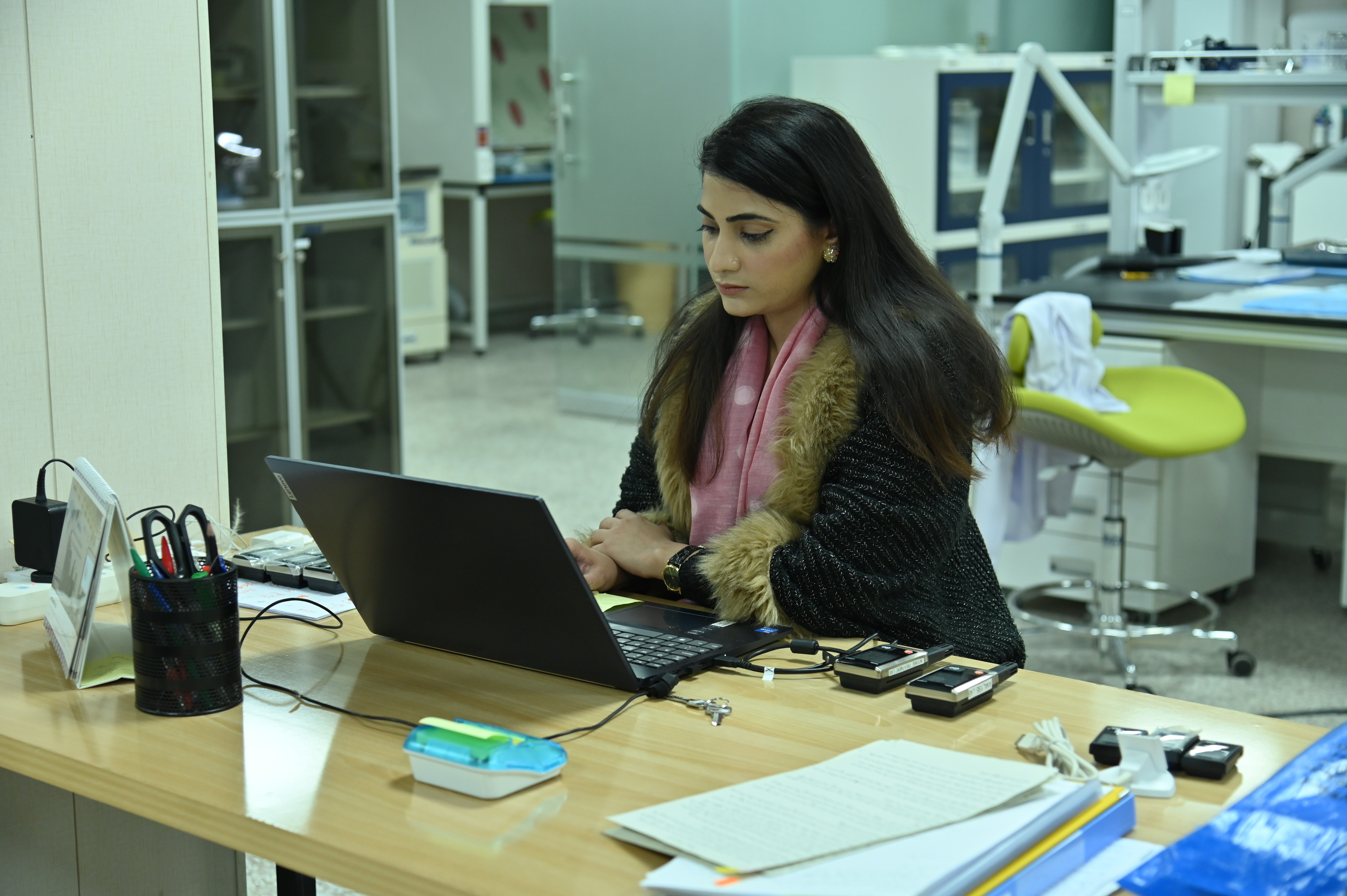 A researcher busy at temperature control Desk in The Gandhara Cultural Heritage Research Center