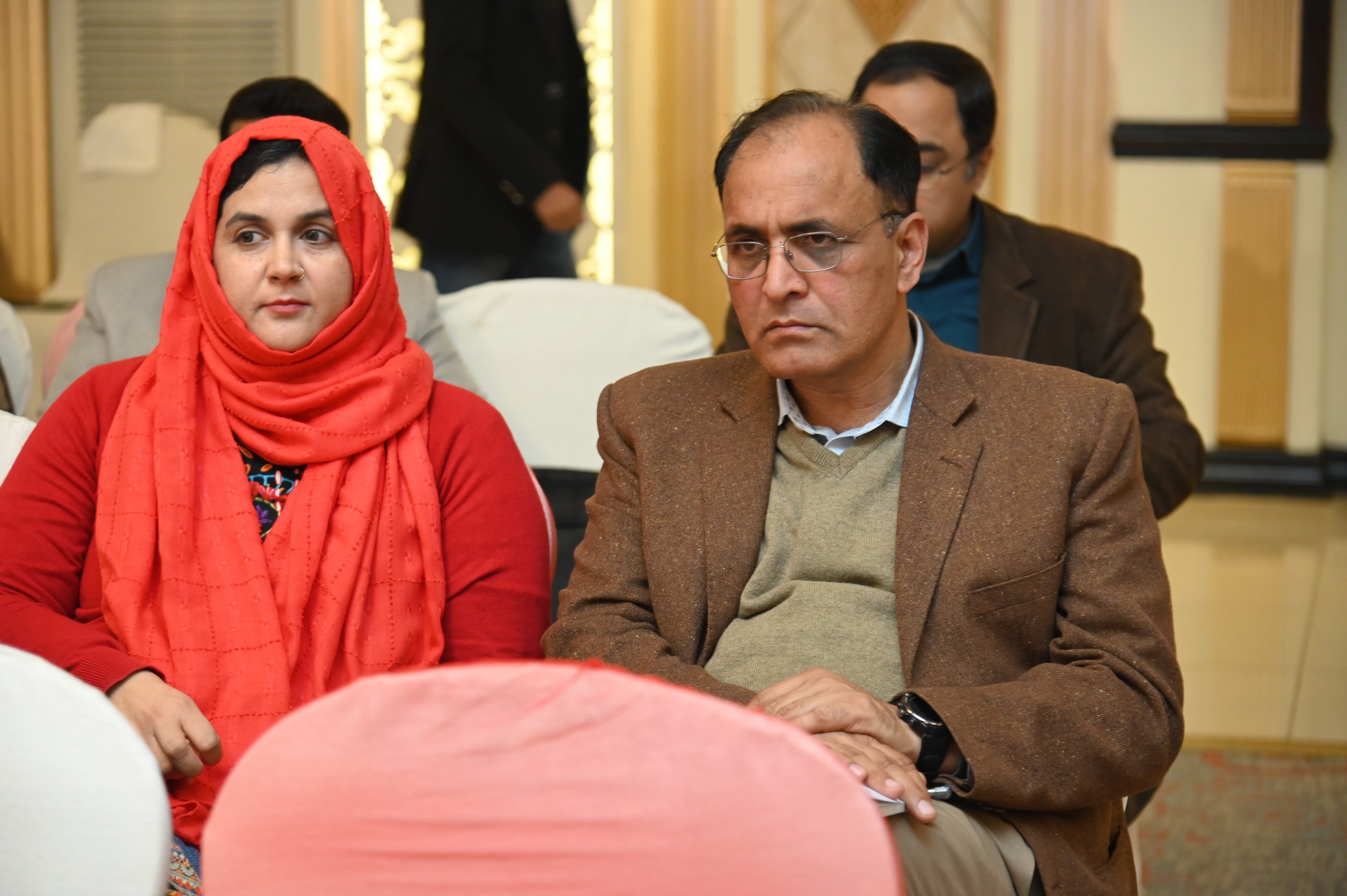 A researcher with Ahsan ul Haq, Assistant Professor at PIDE in the conference