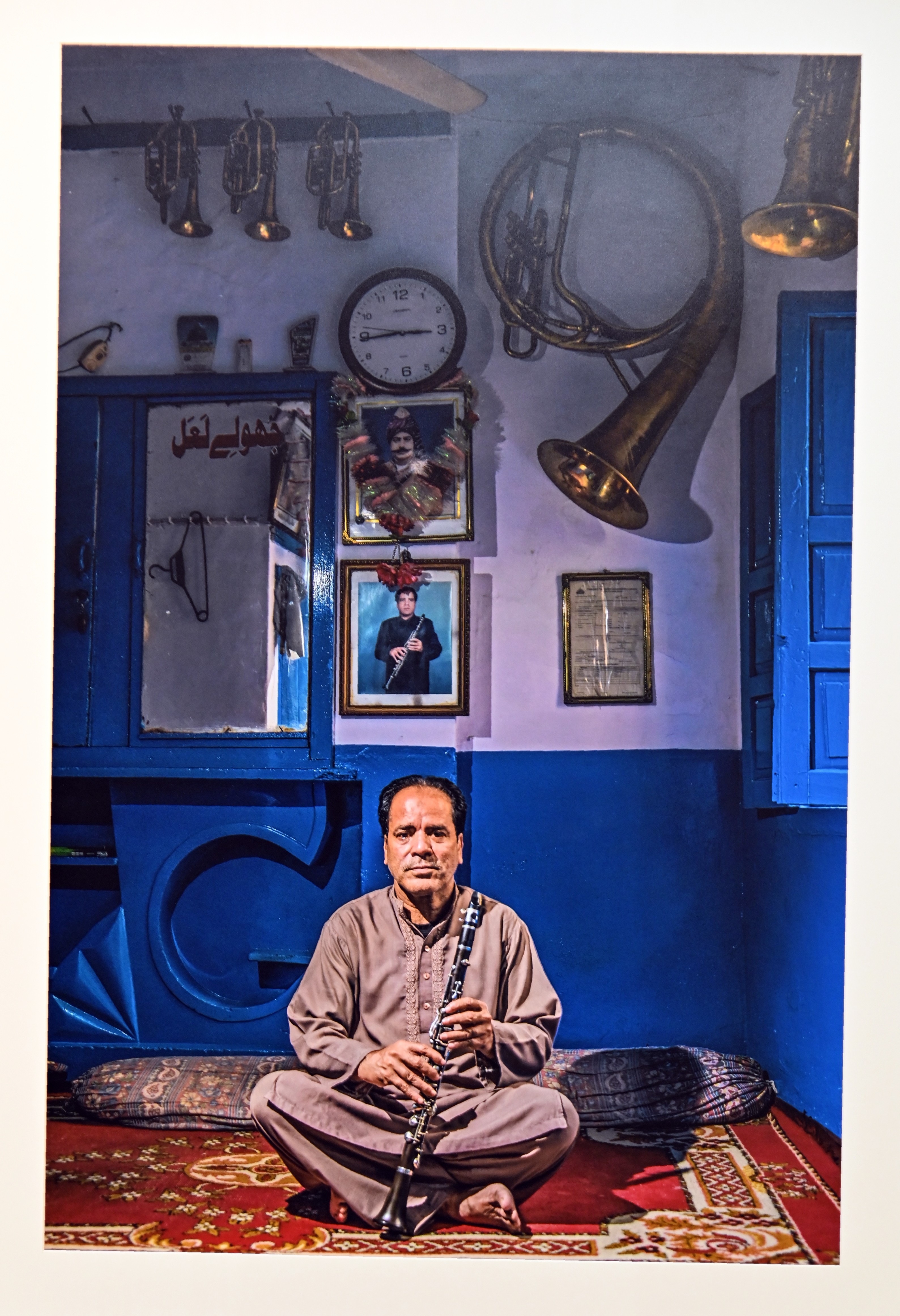 A picture of a musician shop displayed at PNCA, under the theme of Retelling the Story of Pakistani Photographers’ Journey