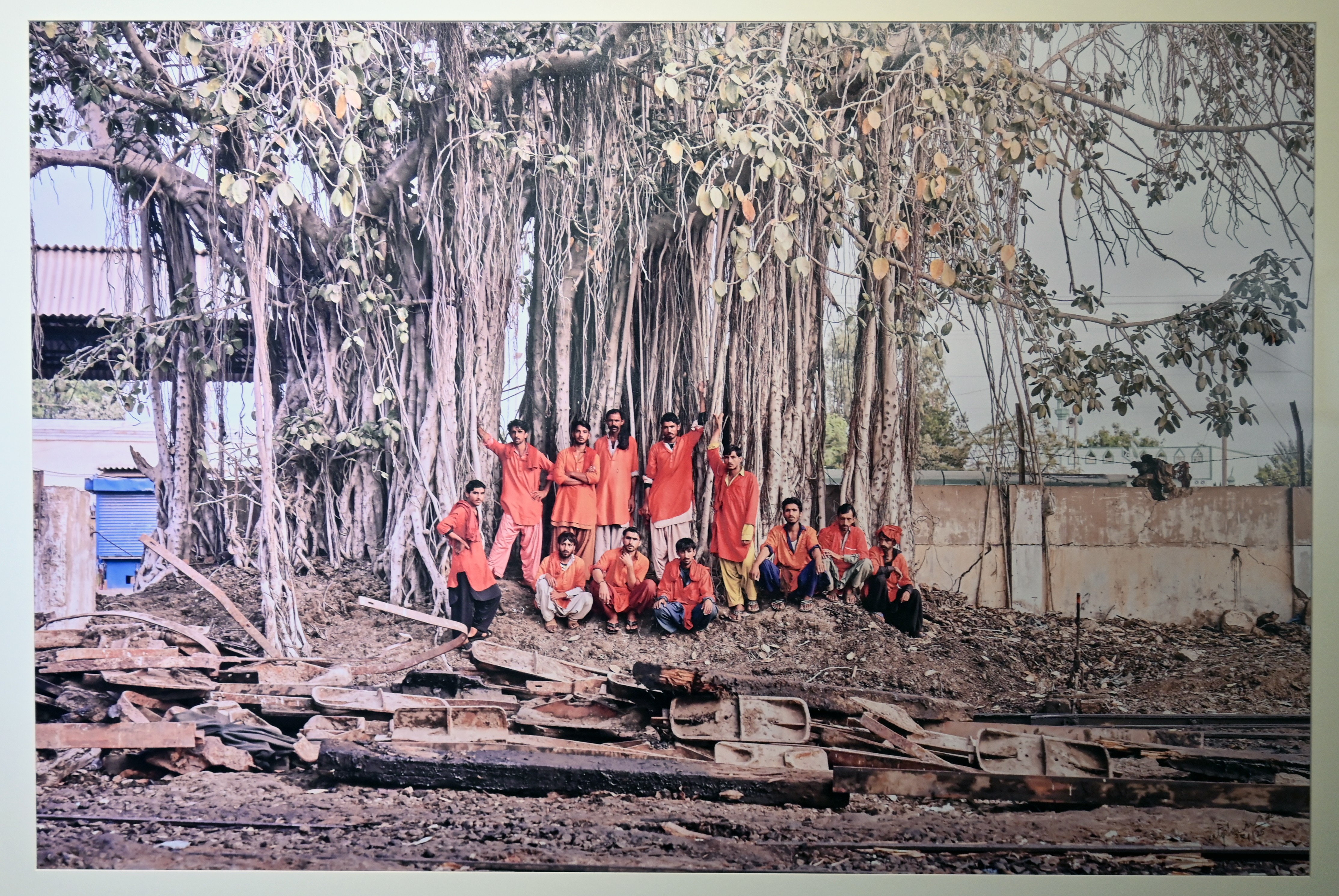 A group photo of Coolie, term used for low-wage labourers, working mainly at the railway station