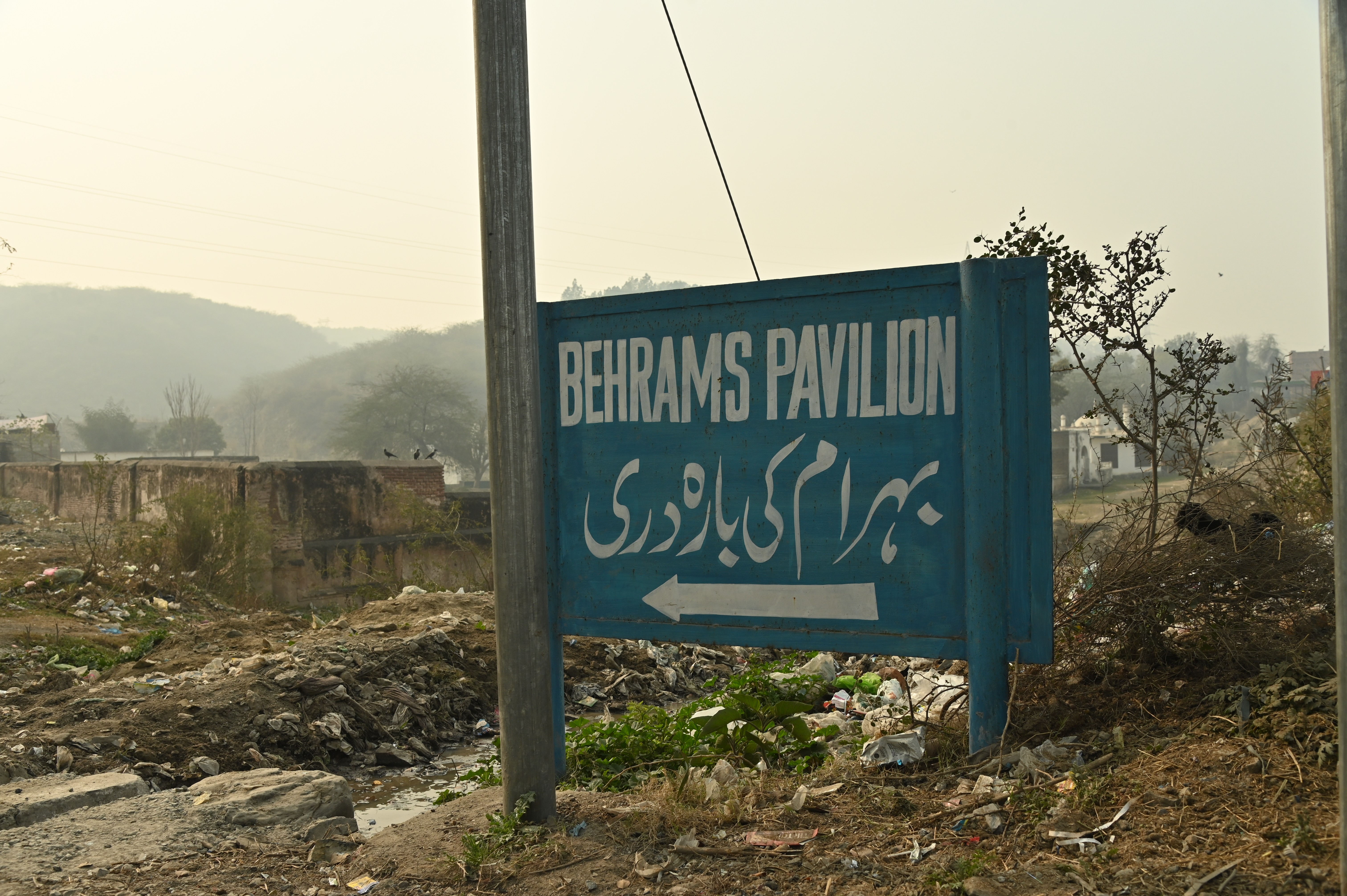 The direction board indicates the direction of Behram ki Baradari