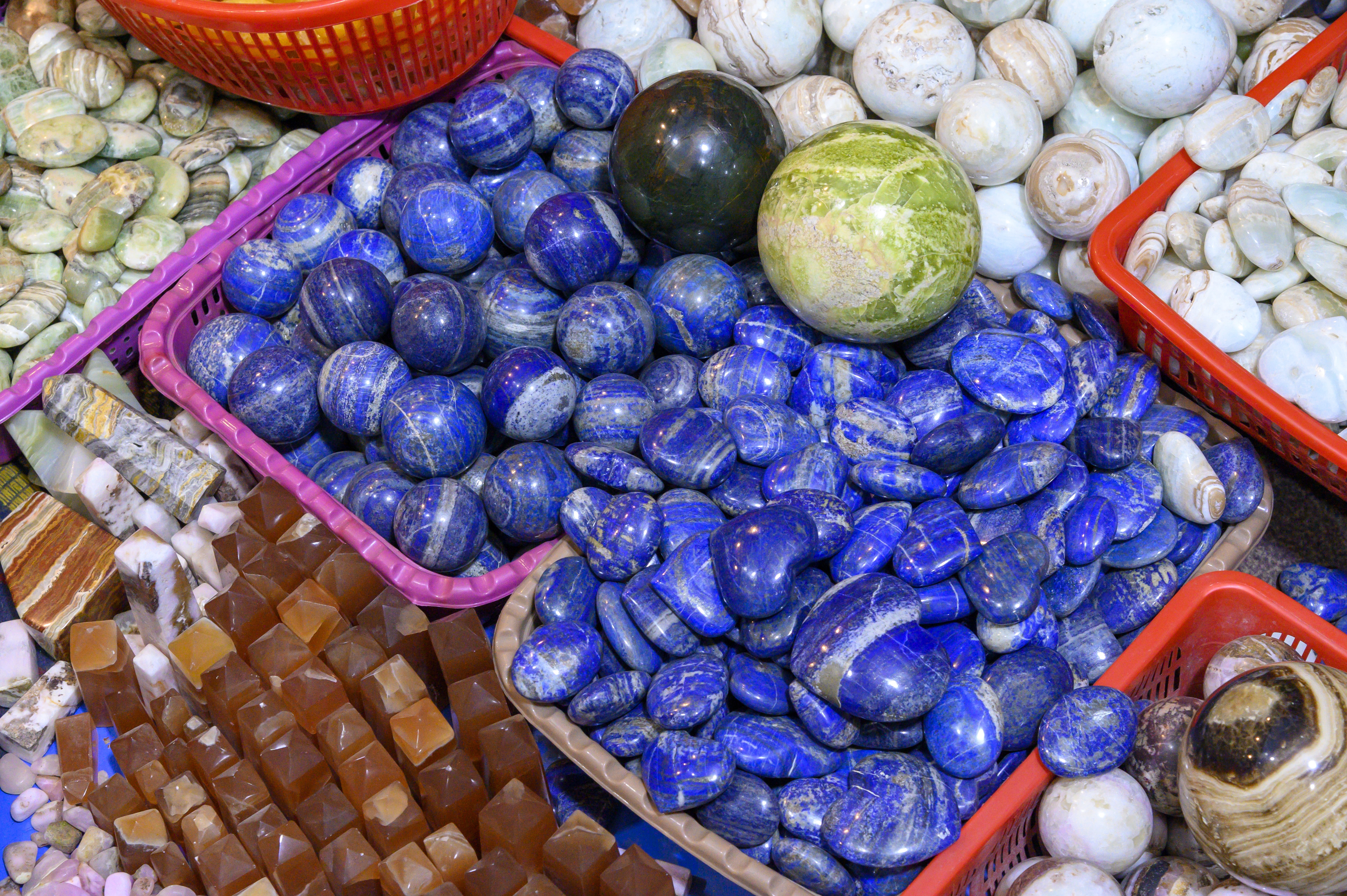 The Serpentine balls and shaped blue Lapis lazuli