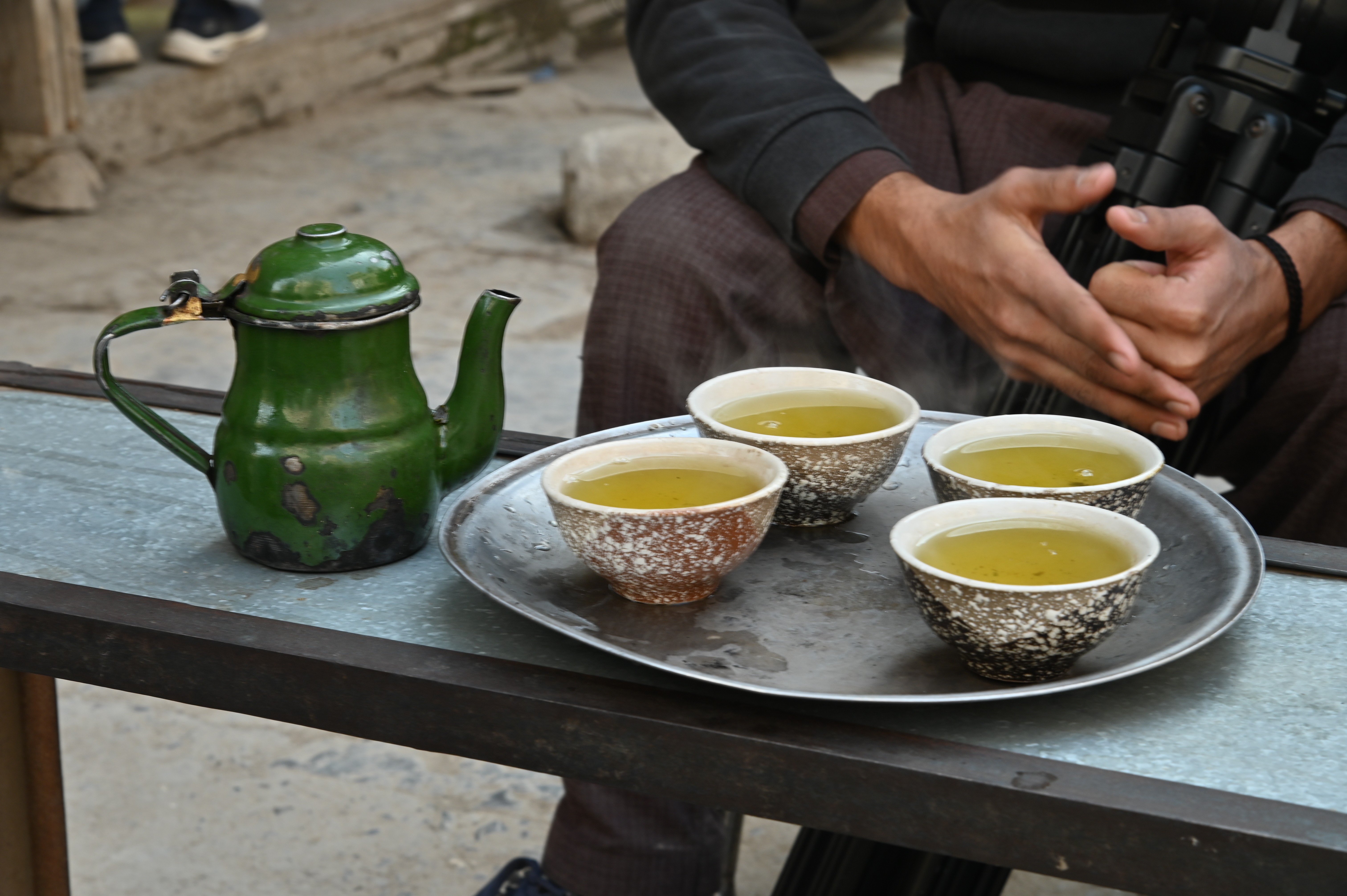 A man selling green tea