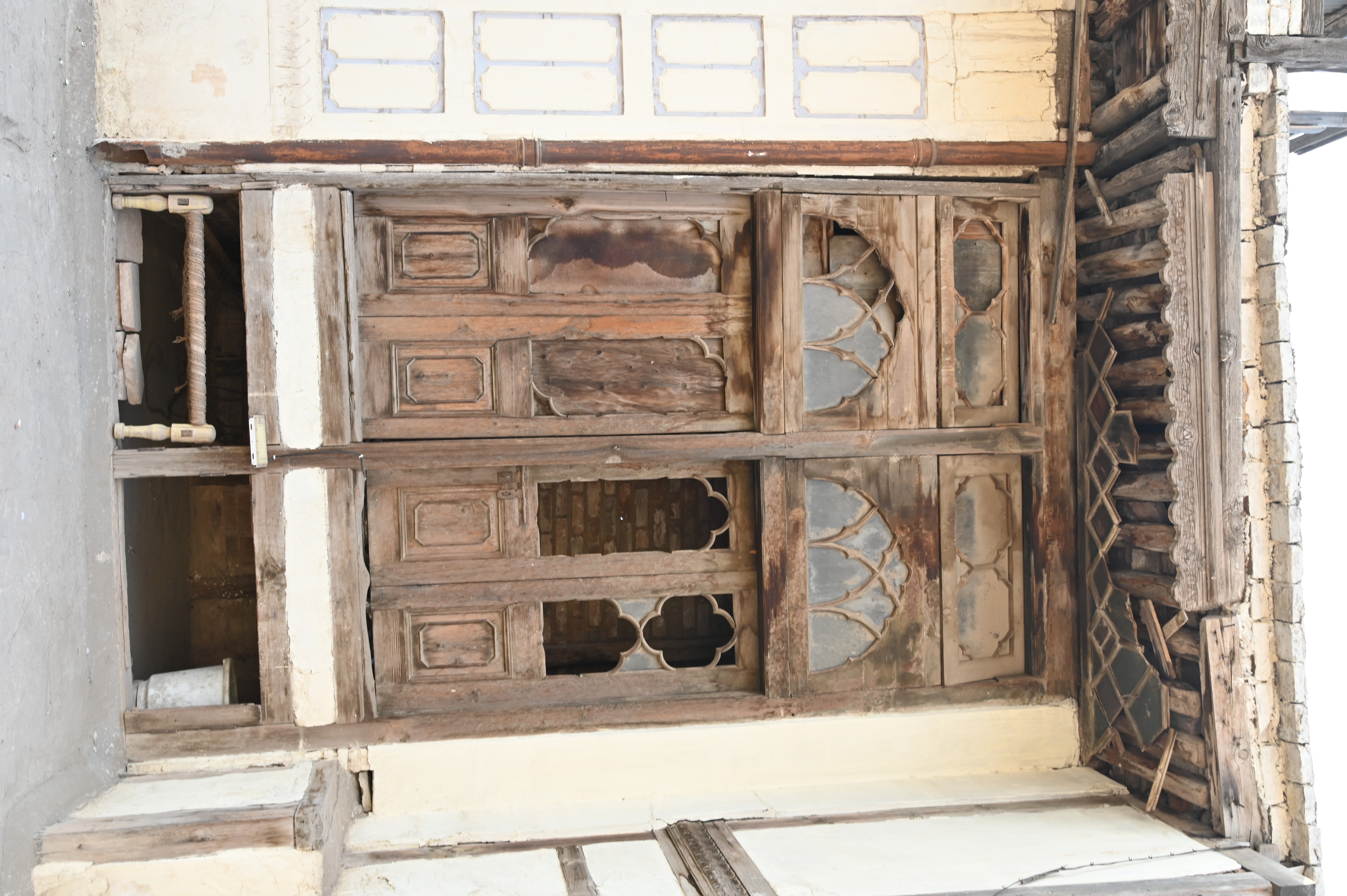 An old fashioned wooden window depicting the ancient culture