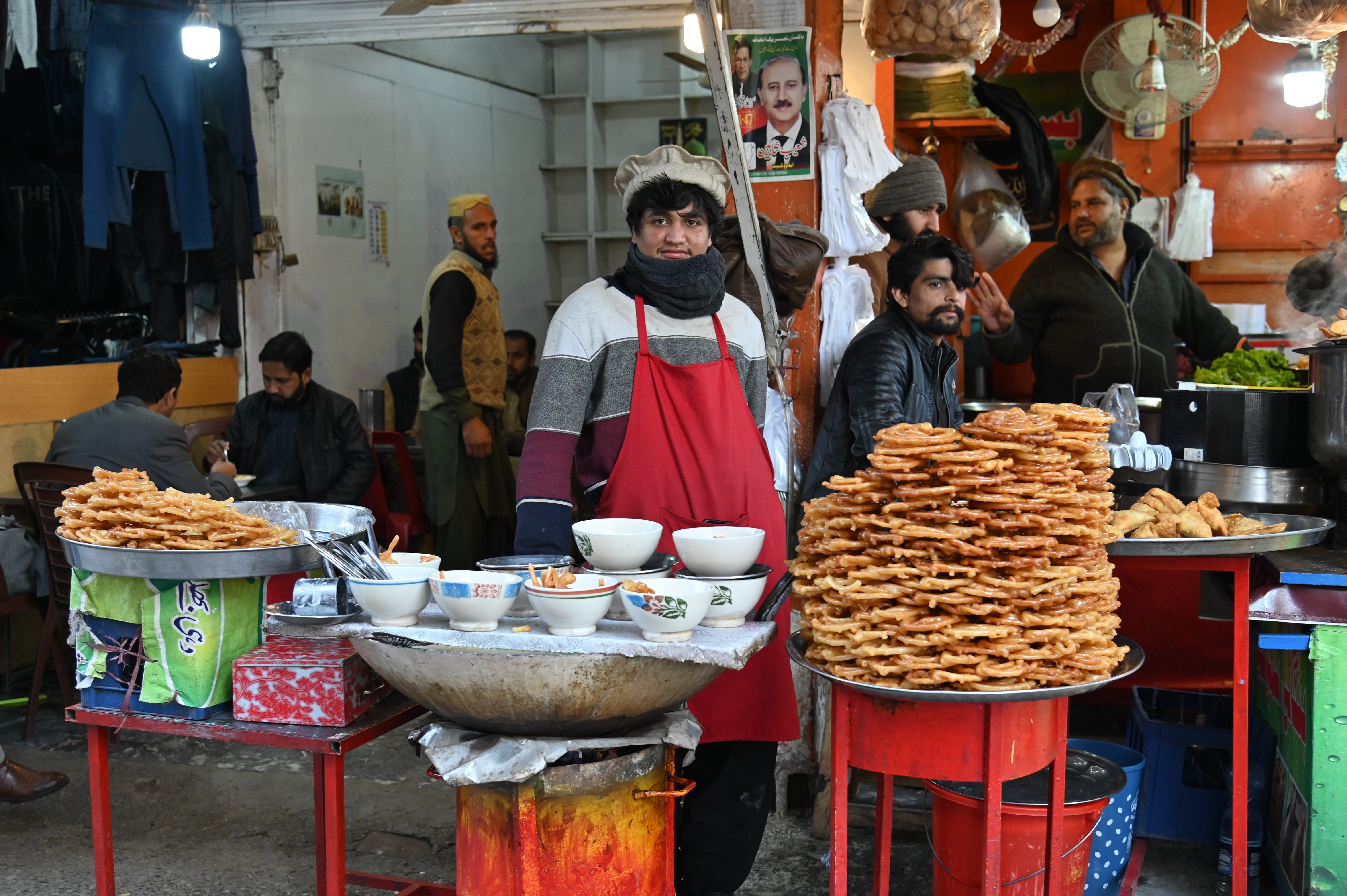 A man selling Jalebi, a popular sweet snack in South Asia