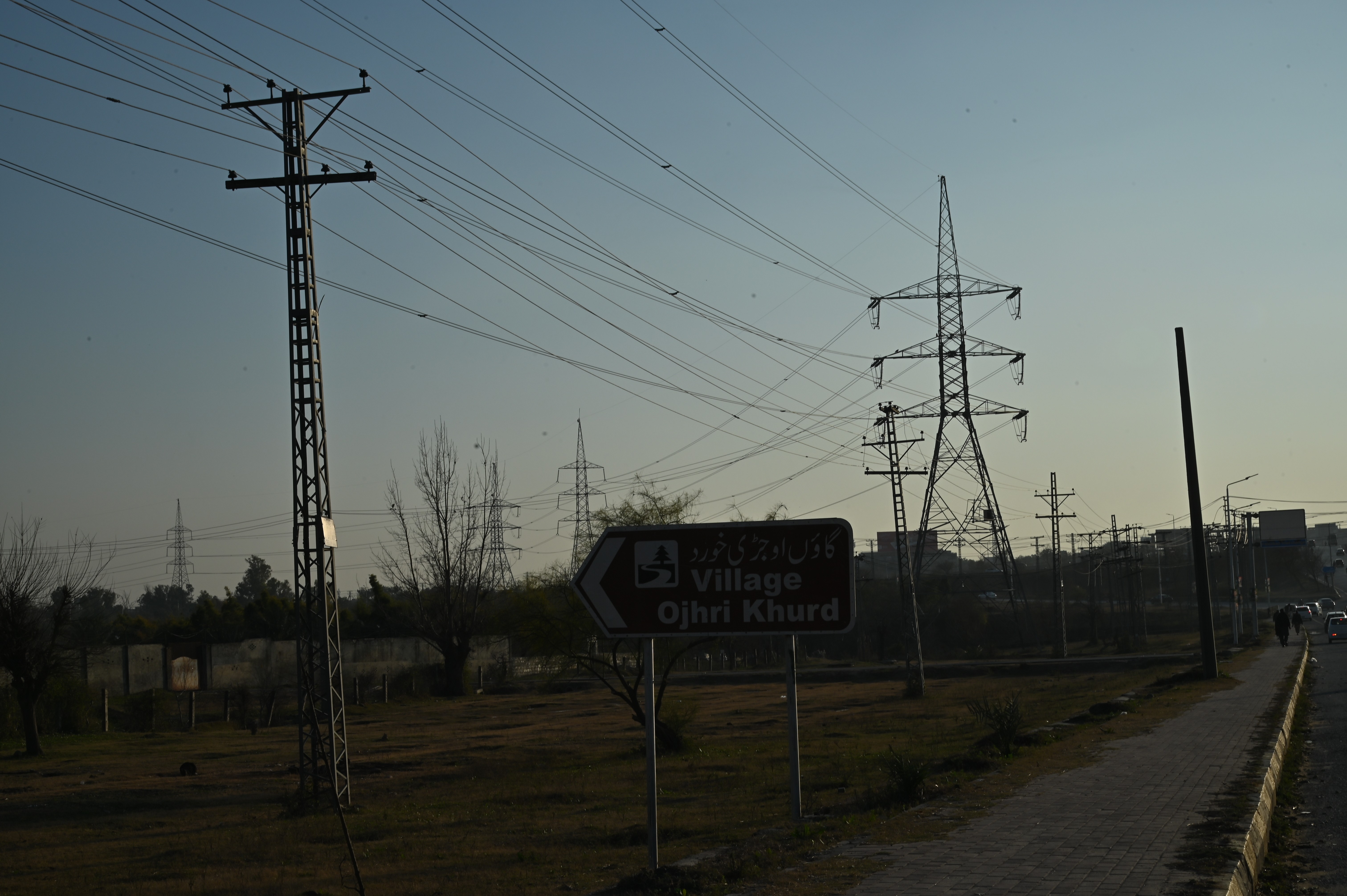 A direction board indicating the location of the village Ojhri Khurd