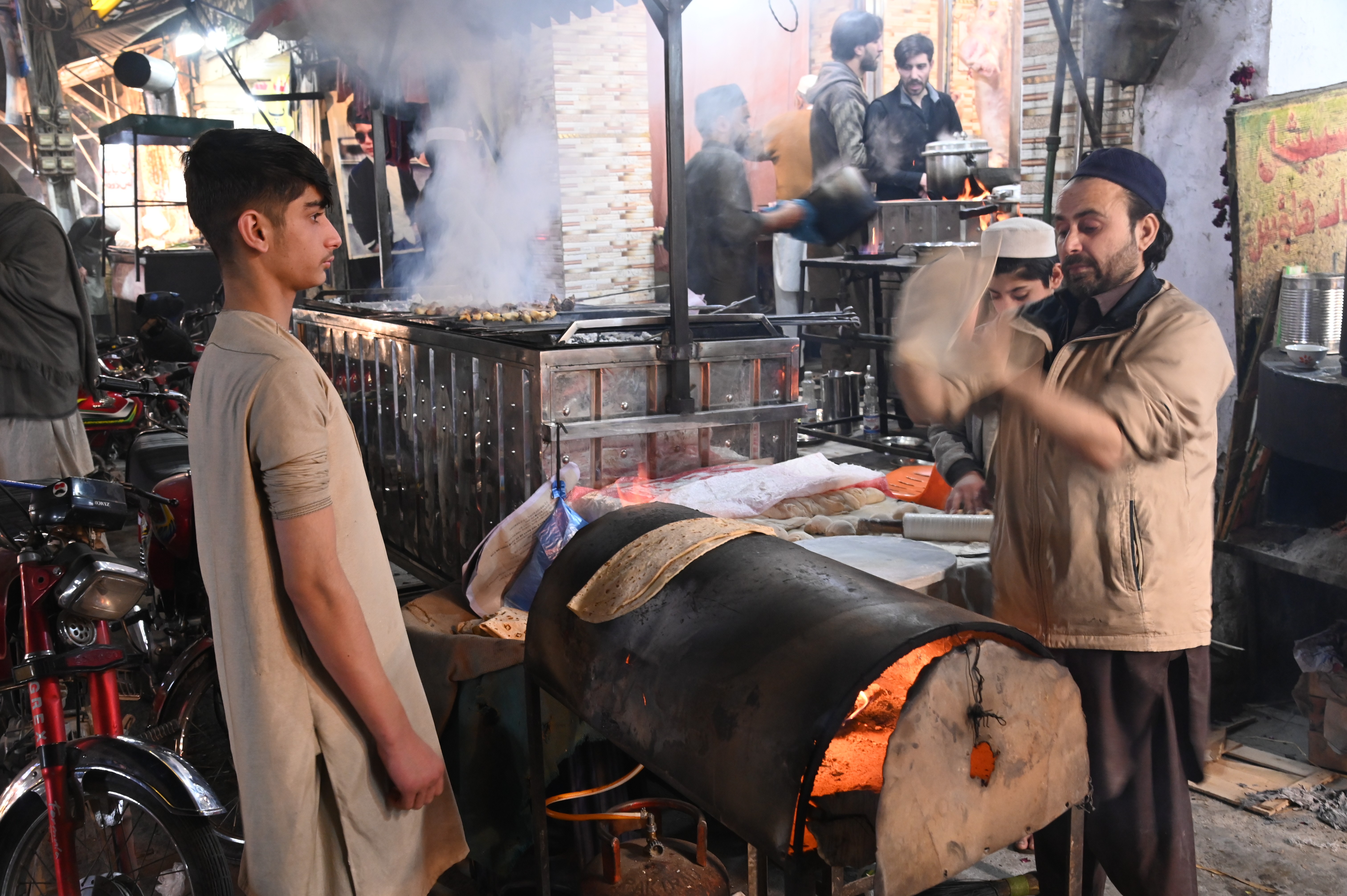A man busy in making Afghani Naan