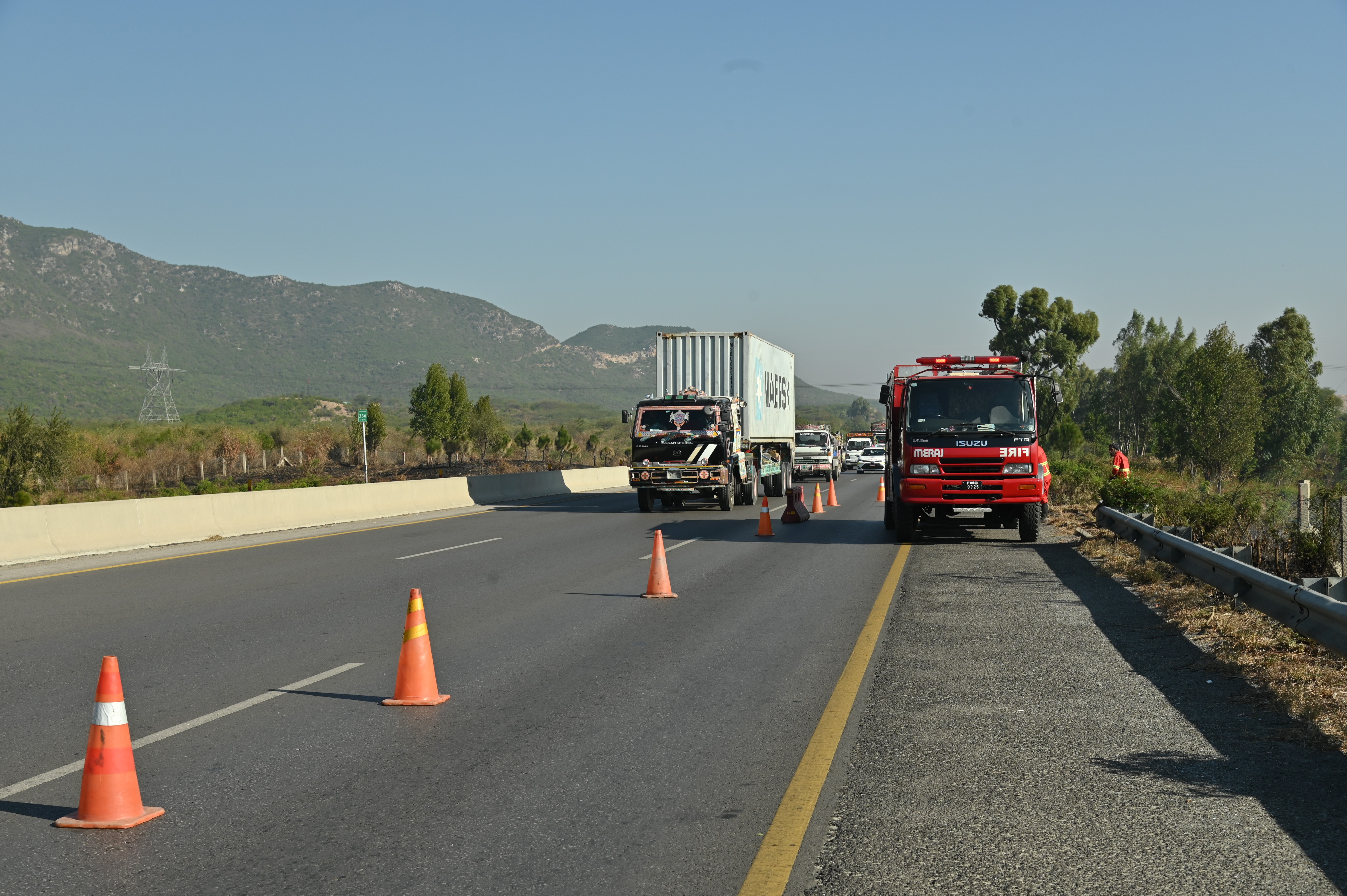 Trucks passing by the motorway