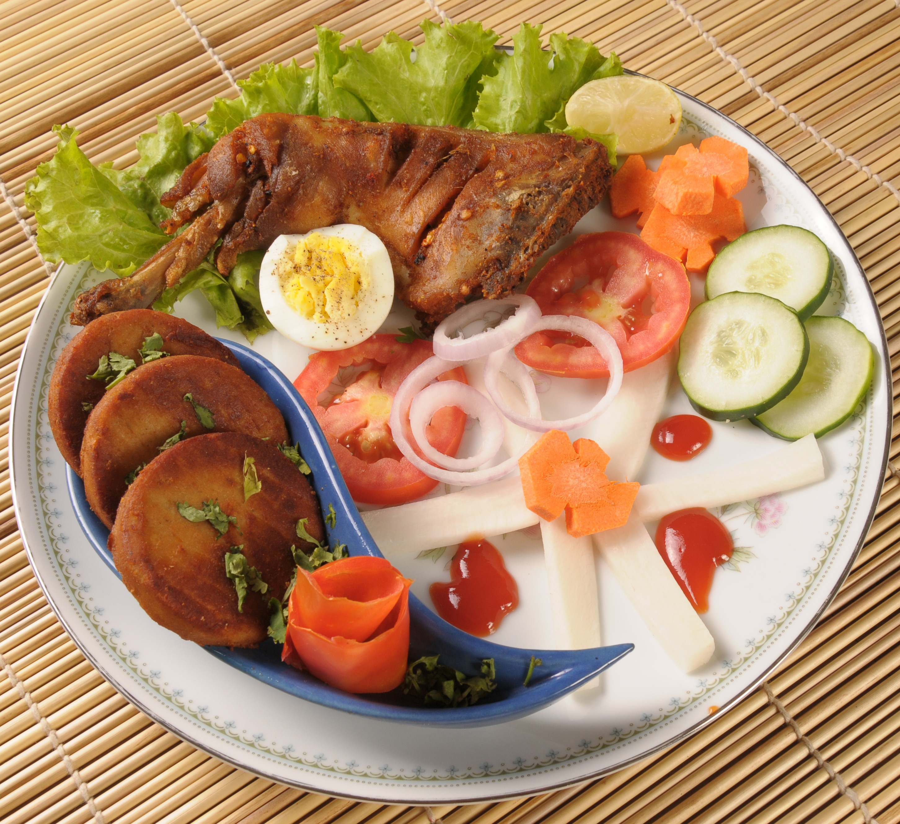 A delicious food served with fresh salad