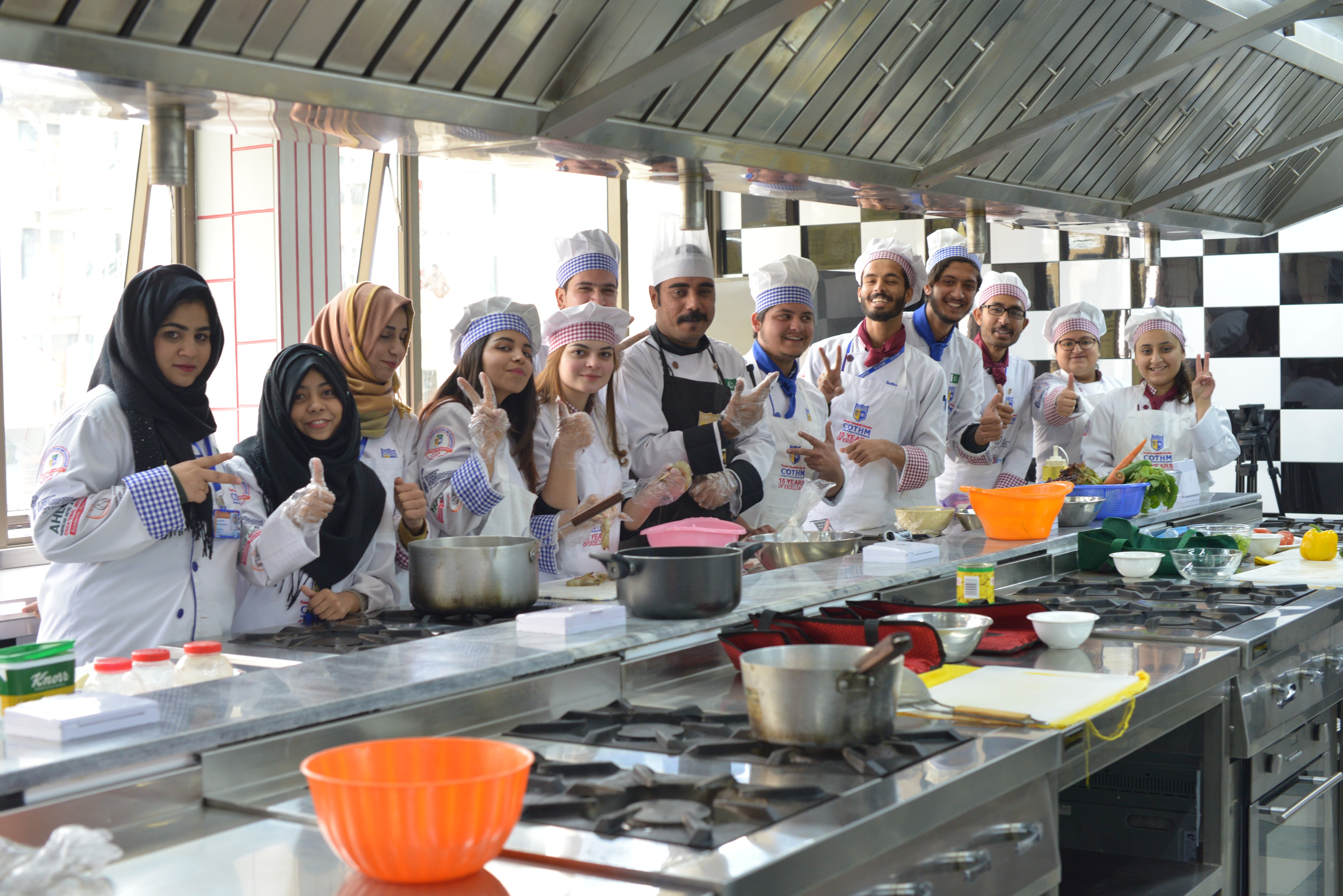 A group photo of students with chef