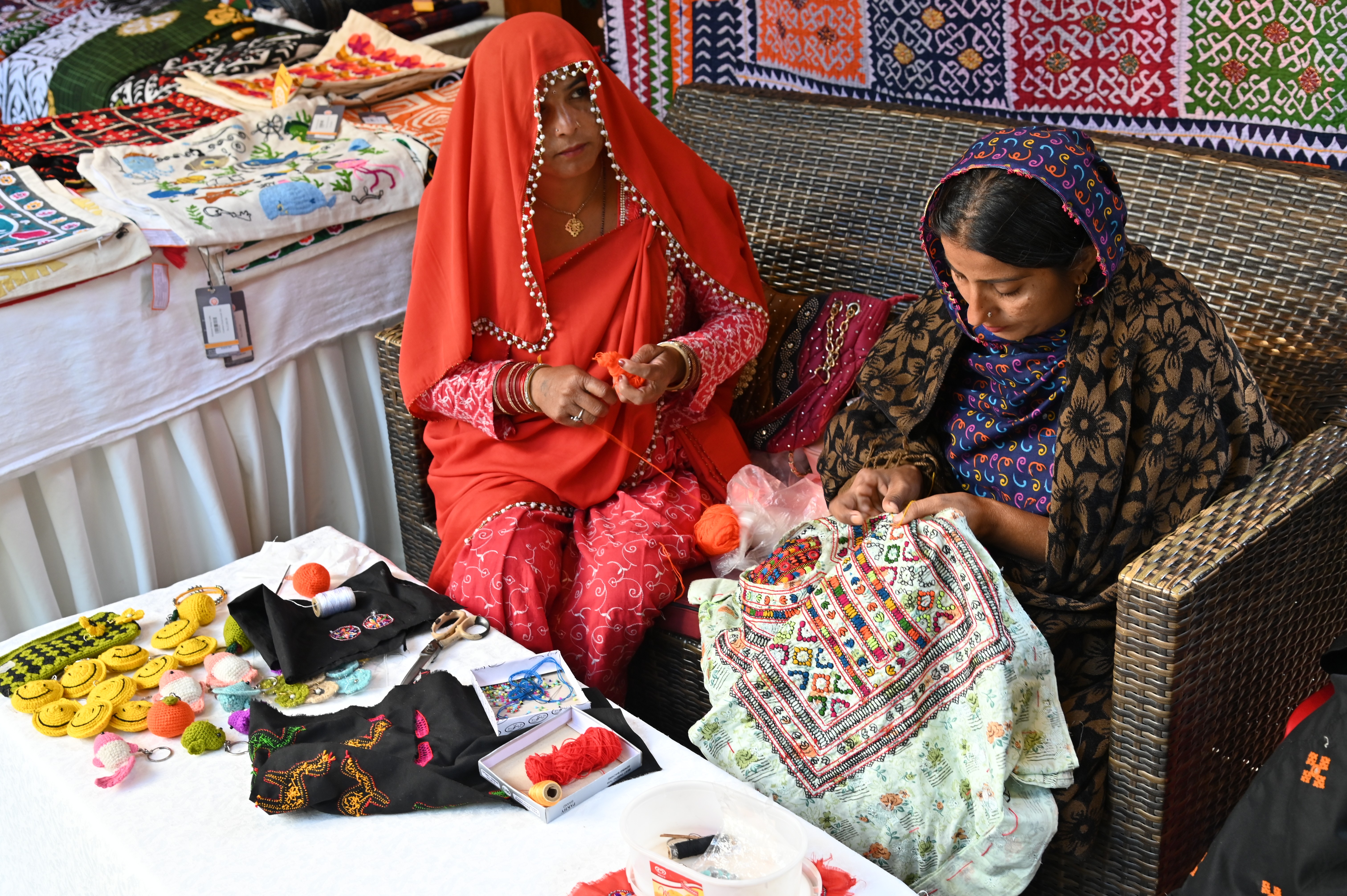 Women busy with embroidery work