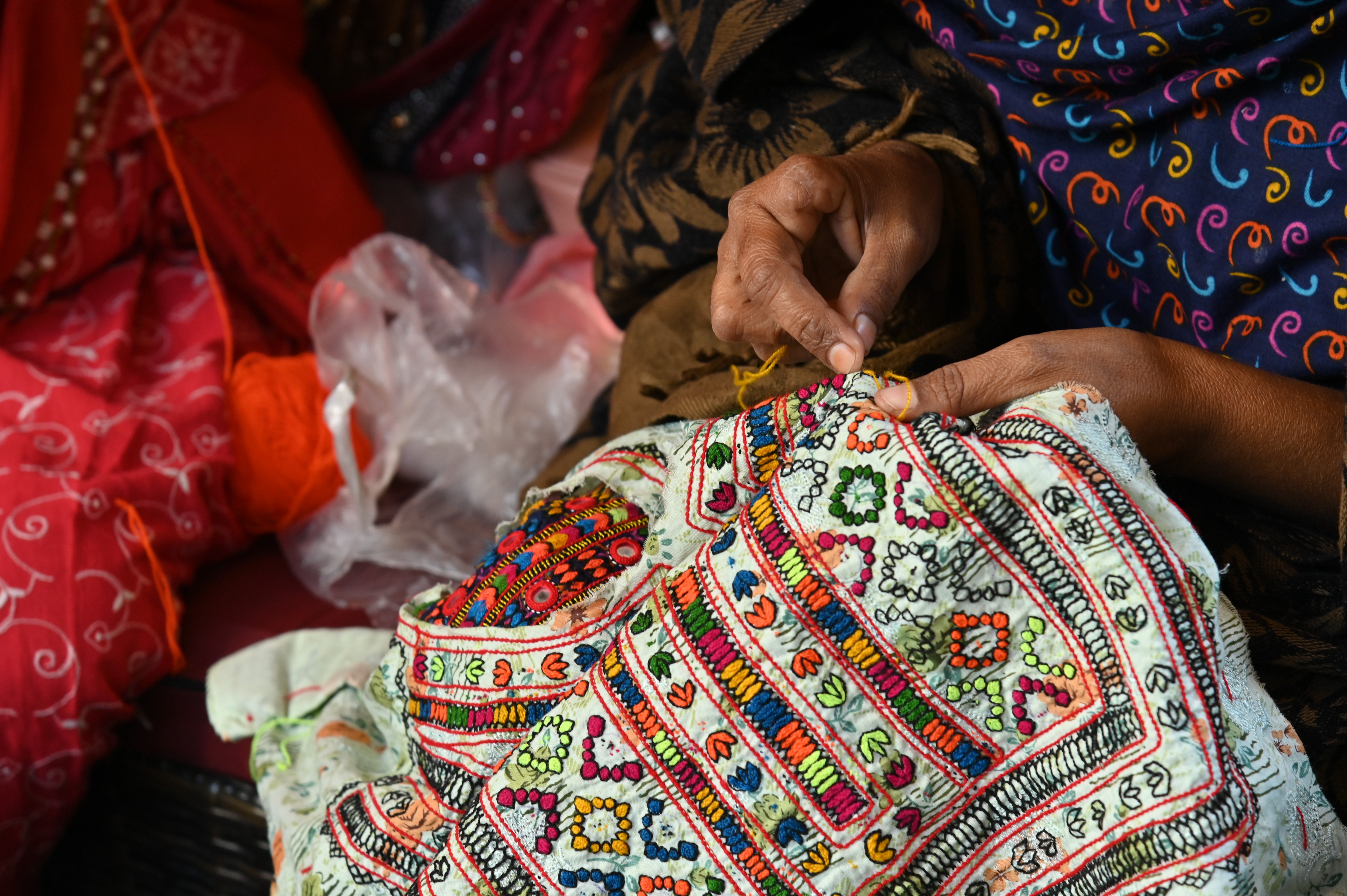 Women busy with embroidery work