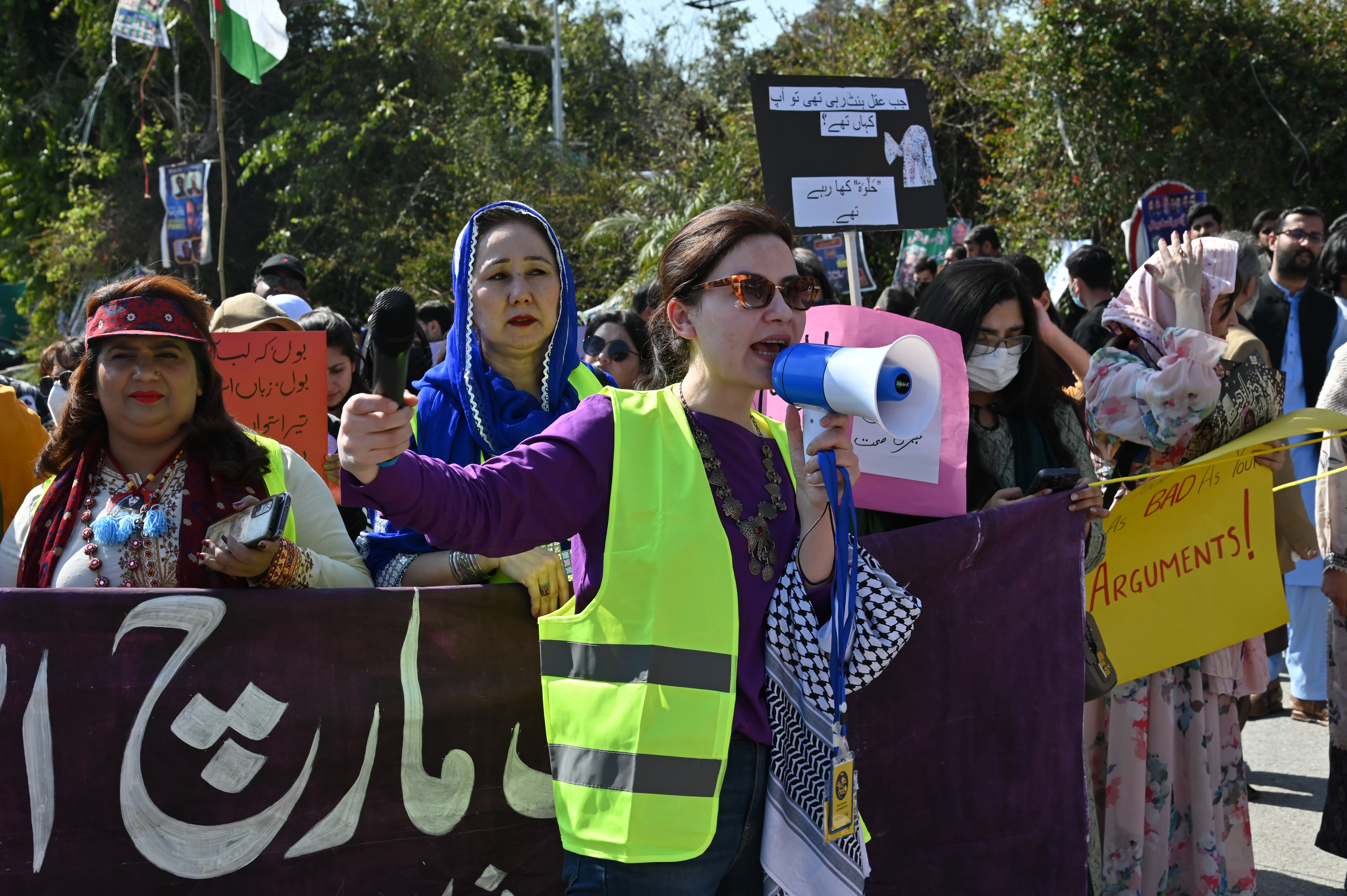 A woman leading The Aurat March