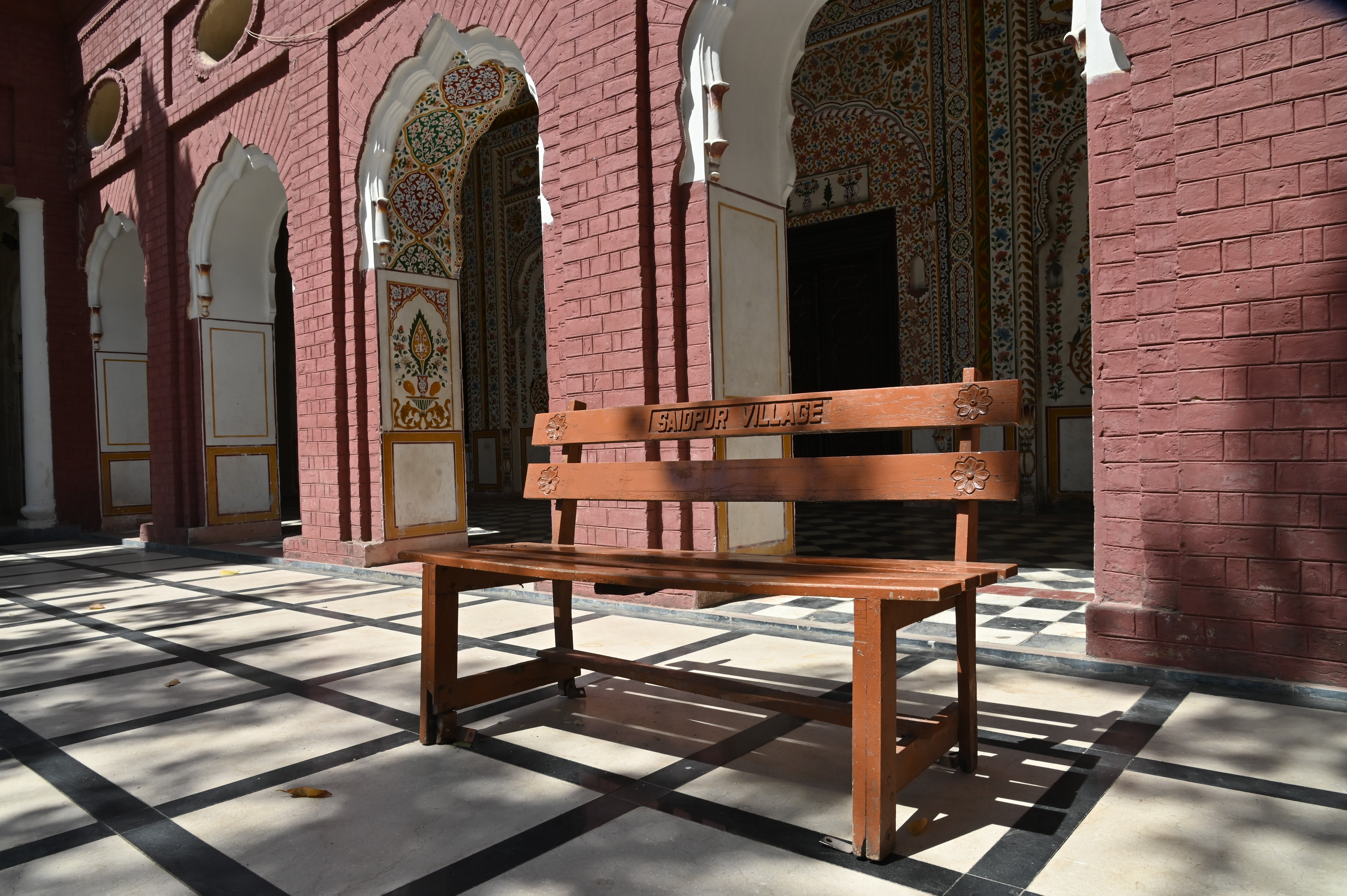 The Wooden bench at the courtyard of Gurdwara Singh Sabah