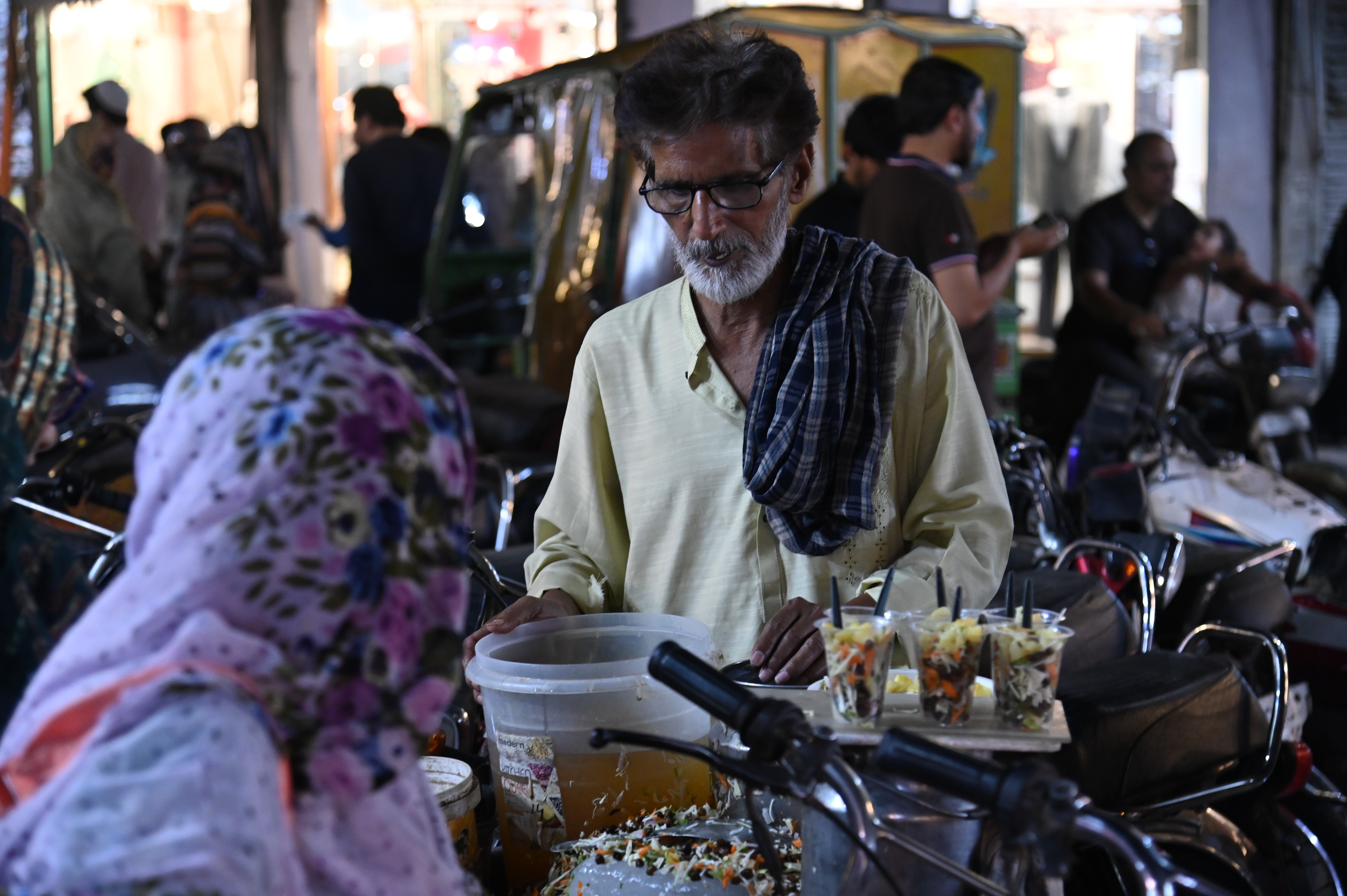 A man selling channa chaat in the local market