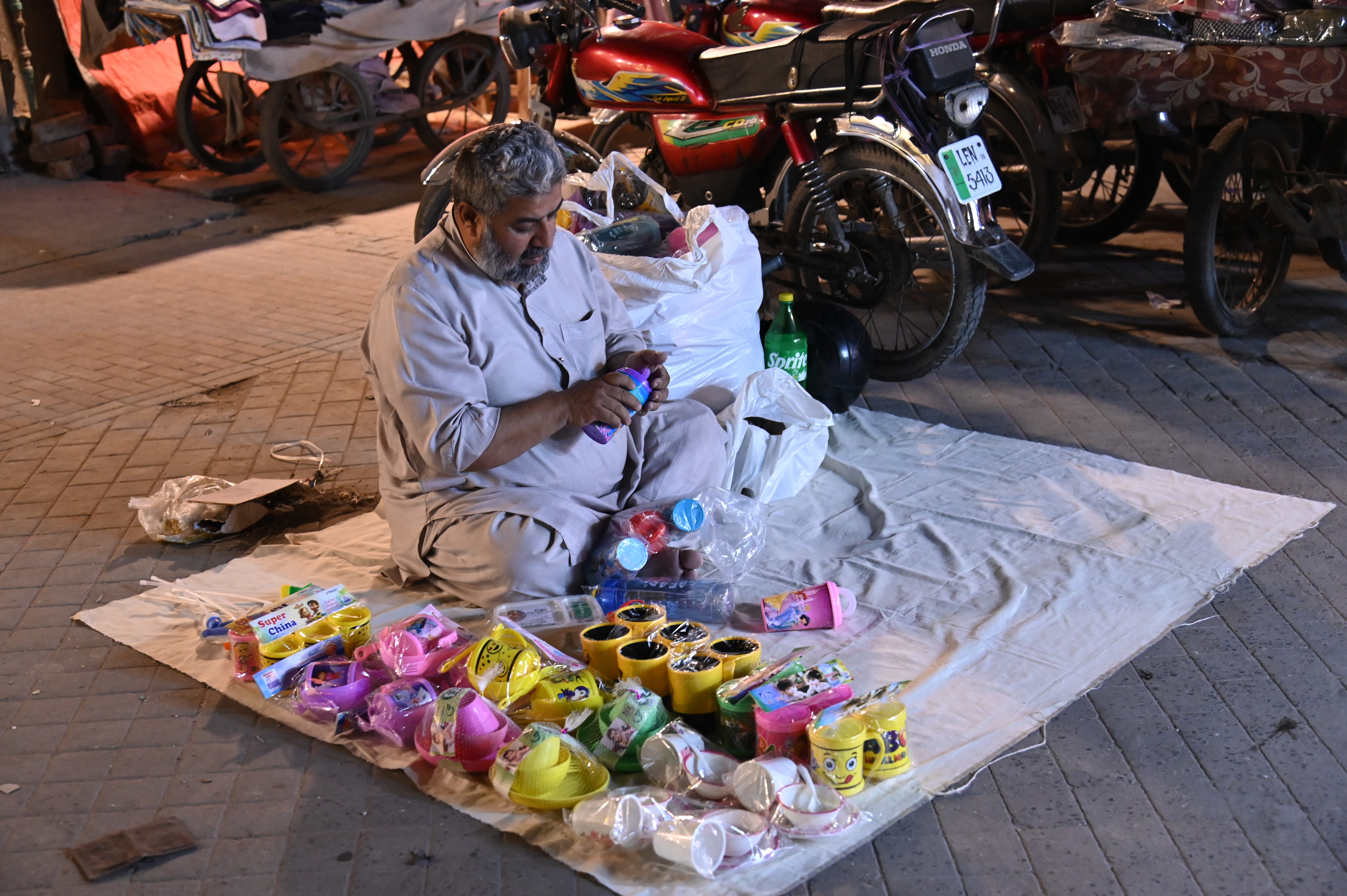 A man selling toys